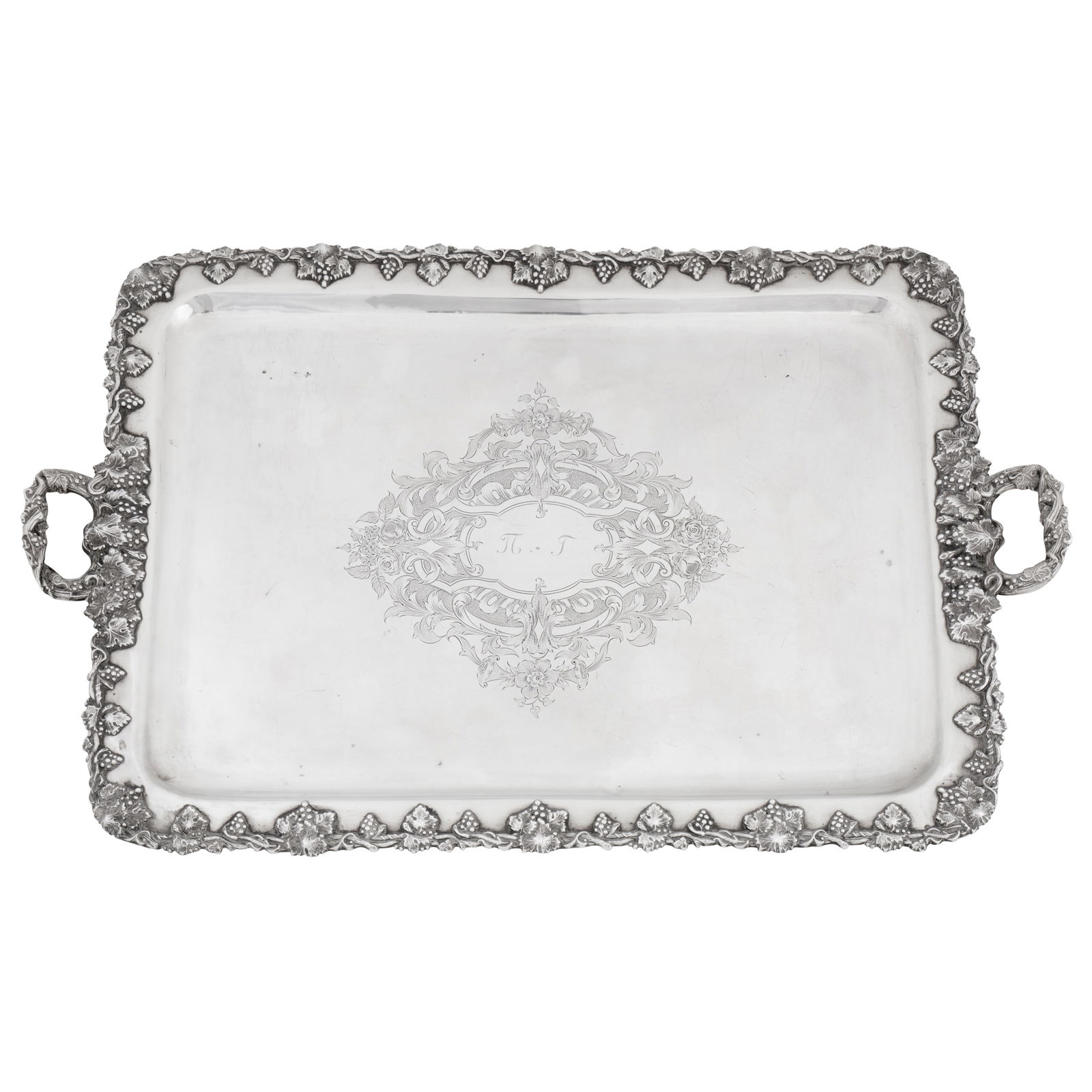Paris circa 1915 by Alphonse Debain An early 20th century French 950 standard silver twin handled: Paris circa 1915 by Alphonse Debain An early 20th century French 950 standard silver twin handled tray Rectangular form with rounded corners, a fruiting vine edge and handles. The centre with flat cha