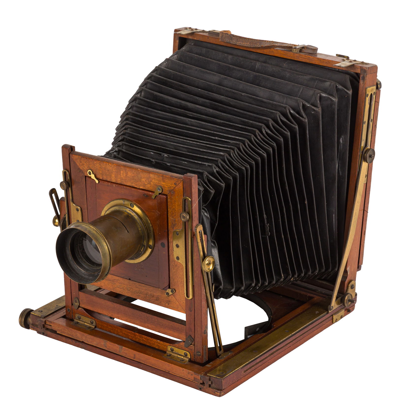 A Whole Plate Mahogany & Brass Field Camera: A Whole Plate Mahogany & Brass Field Camera Body: G, black leather tapered bellows - pinion focussing slipping Lens: Sands & Hunter 8 1/2 x 6 1/2" Rapid Rectilinear Optics: G Notes: complete with glas