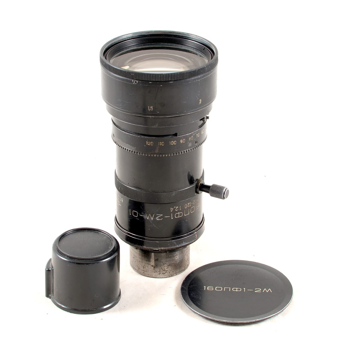 Arriflex Fit 12-120mm f2.4 Cine Zoom Lens.: Russian manufactured by KMZ. PL mount? #800128. Signs of heavy use with several internal specks and paint flakes, plus a small scratch to extremity of frot element.