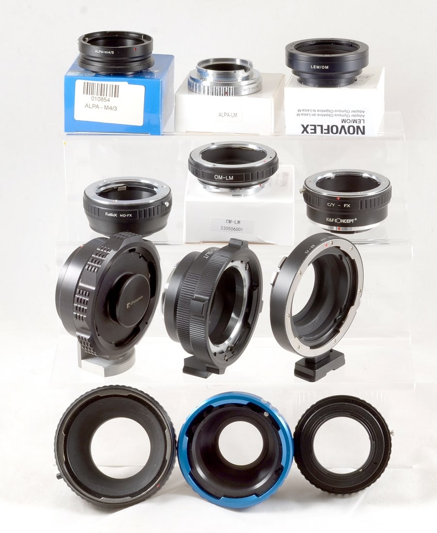 C7 Arriflex PL Lens to E Mount, Alpa & Other Adapters.: To include high quality Arriflex PL to Hasselblad(?), PL to SL/T & PL to Sony E adapters. Also Alpt to M4?3rd and Leica M, Pentax 67 to PK, Nikon Ai, Minolta MD and a C/Y to FX and an OM to Leica M ad