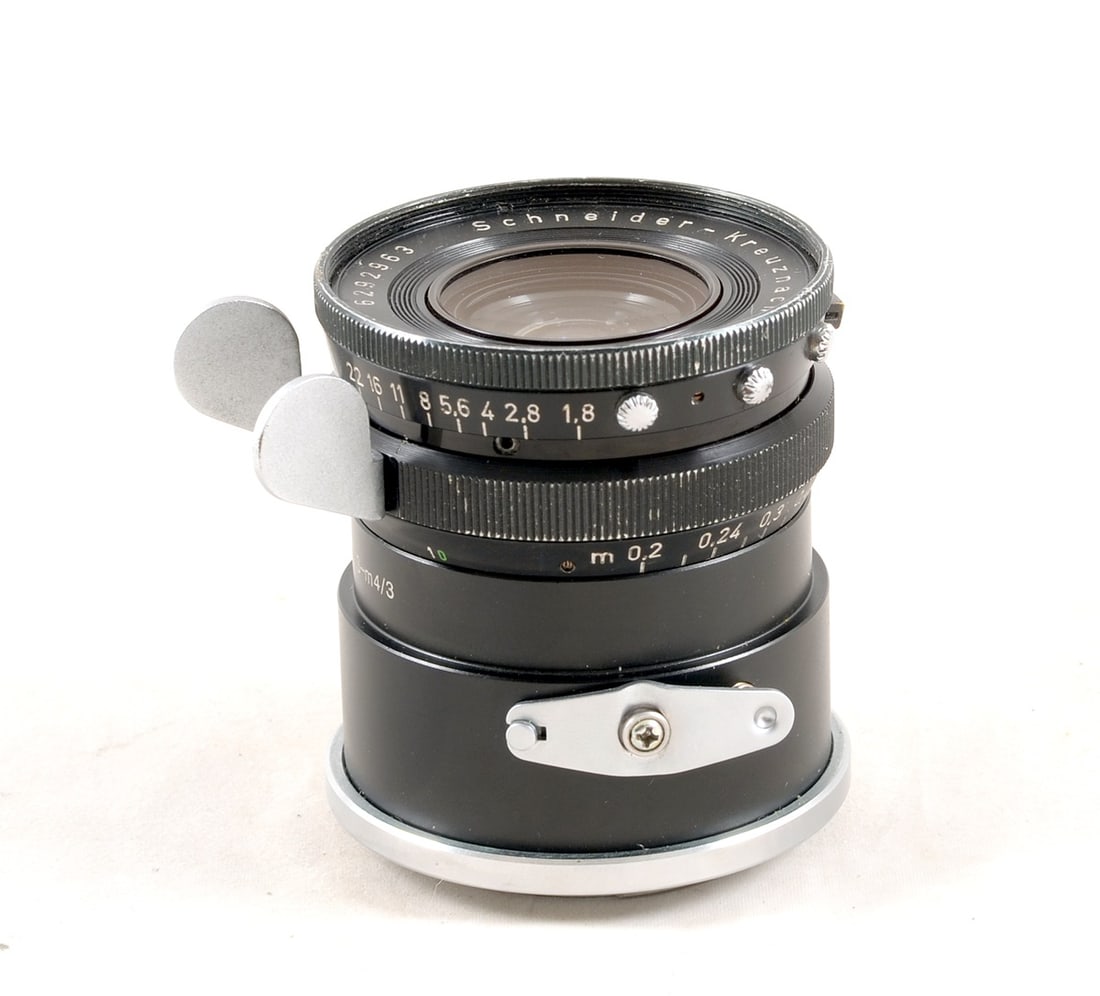 Schneider 10mm f1.8 Cinegon Lens in a Arriflex S Mount.: #6292963. Cosmetically signs of normal use, but internal fungus has softened resulting image considerably. Apertures marked to f22, focusing from .8 feet to infinity . Gives practically a full 360 deg
