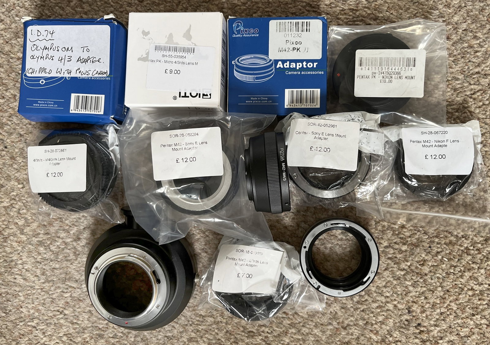 Pentax 67 to PK. Pentax PK M42 & Other Lens Mount Adapters.: Adapters to mount lenses to or from a Pentax PK and Screw Mount cameras etc. All seem to be in good condition, with some new and unused.