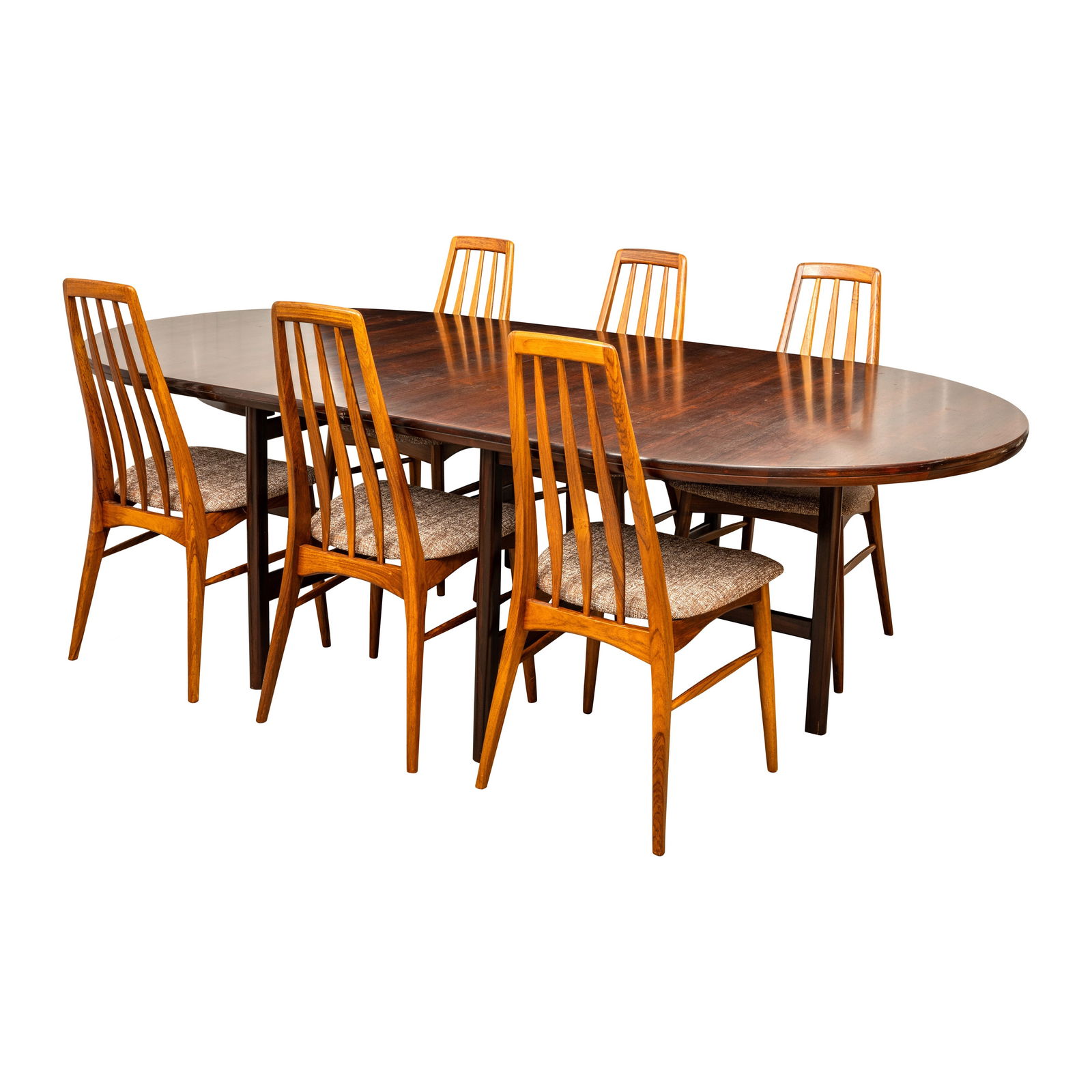 Niels Koefoed (Danish) for Koefoed's Hornslet, Denmark Dining table and six dining chairs: Circa 1970s Rosewood, upholstery Stamped 'Made in Denmark, Koefoed's Hornslet' Table 73cm high x 244cm long x 121cm deep Chairs 95cm high x 46cm wide x 43cm deep