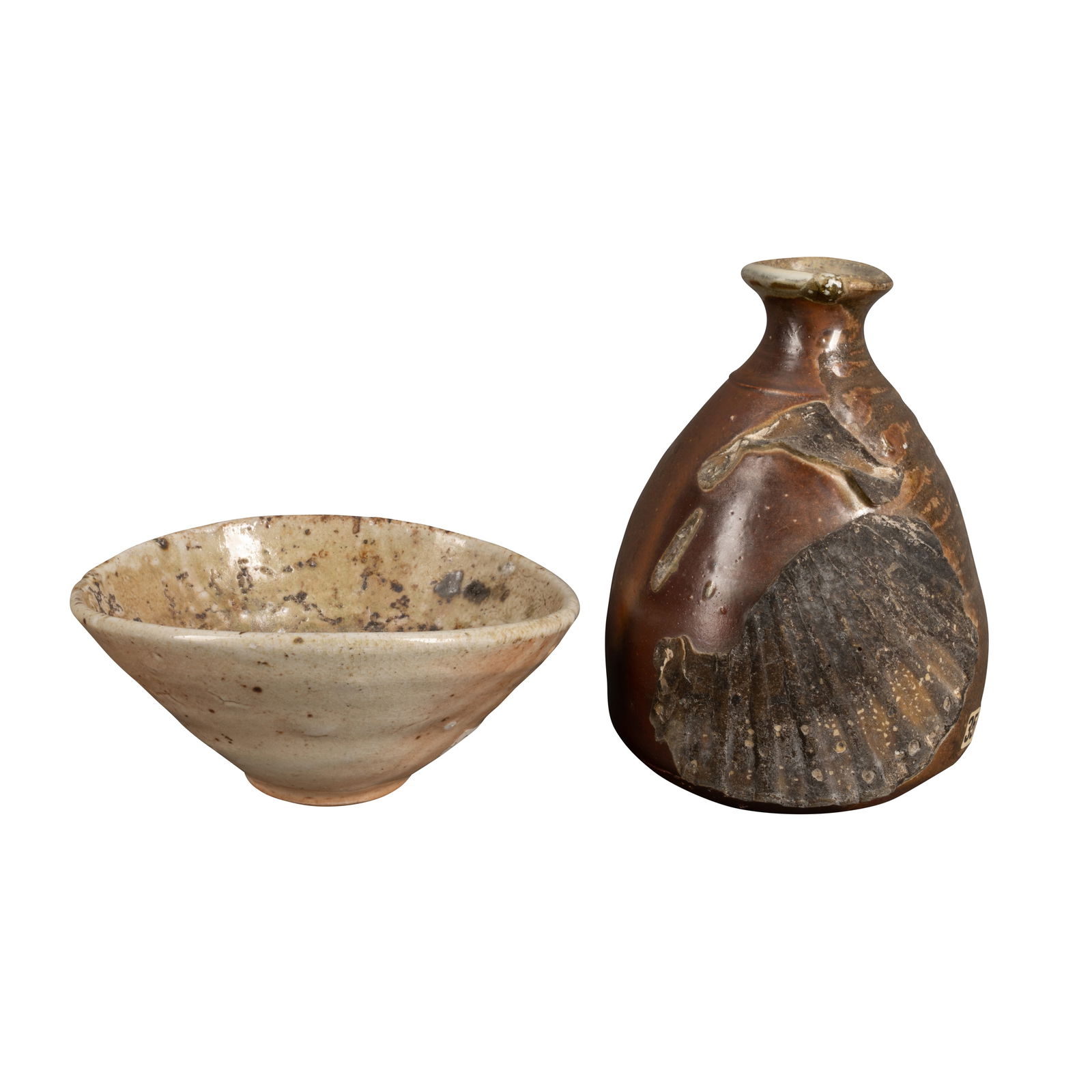 Nic Collins (British b.1958) Bottle vase encrusted with shells, and a bowl in shino glaze with (1 of 1)