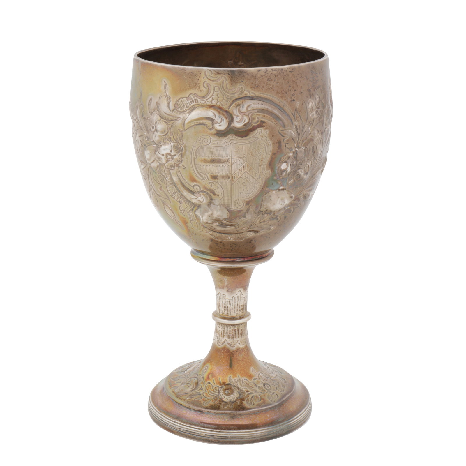 London 1808 by Charles Hougham A George III sterling silver goblet: London 1808 by Charles Hougham A George III sterling silver goblet Of rounded circular form with a pedestal foot. Later embossed decoration and an engraved impaled coat of arms. Fully marked undernea