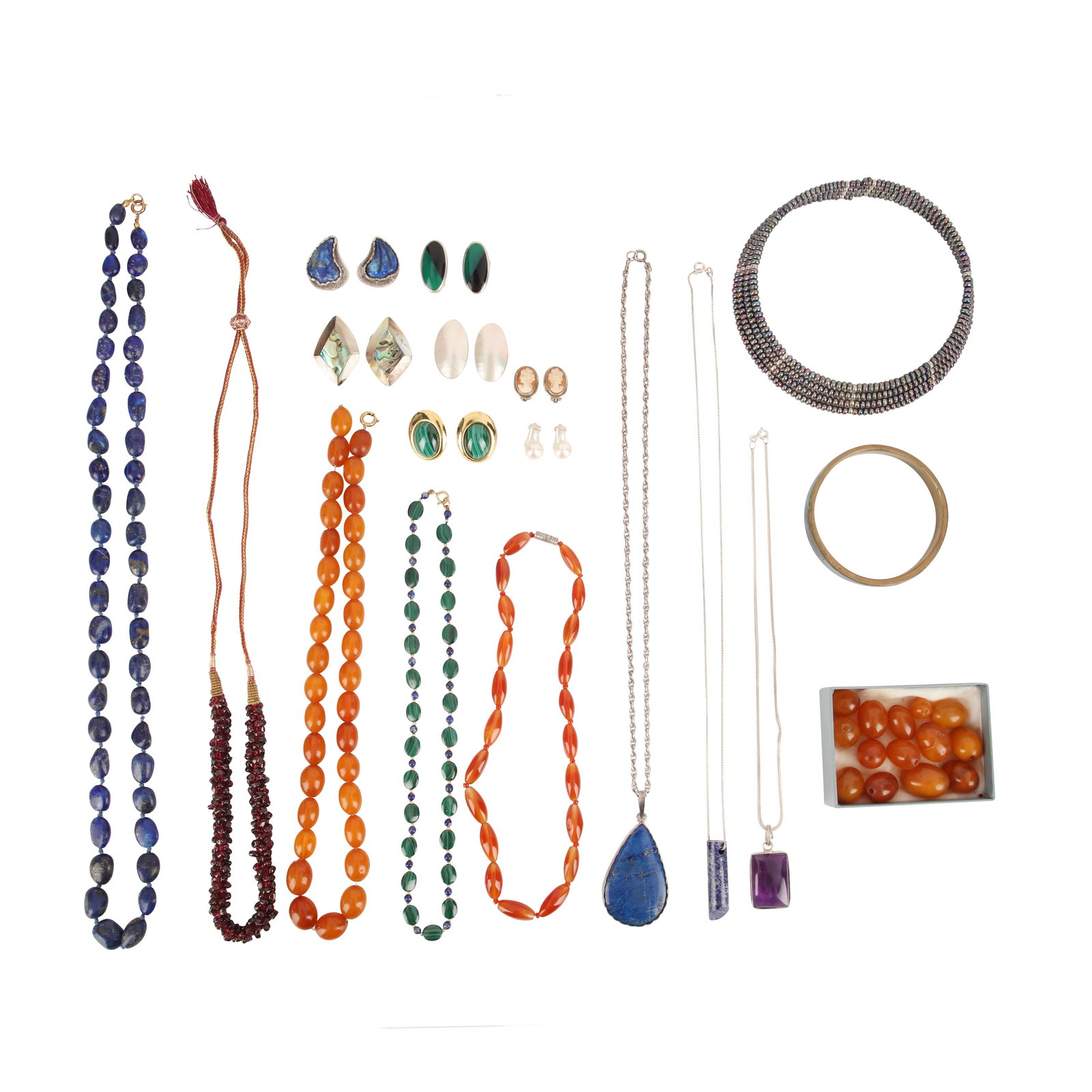 A collection of gem set jewellery: A collection of gem set jewellery To include necklaces, earrings, a bangle, and some loose beads, set with gemstones such as garnet, carnelian, malachite, amber, lapis lazuli, pearl, amethyst, and ca