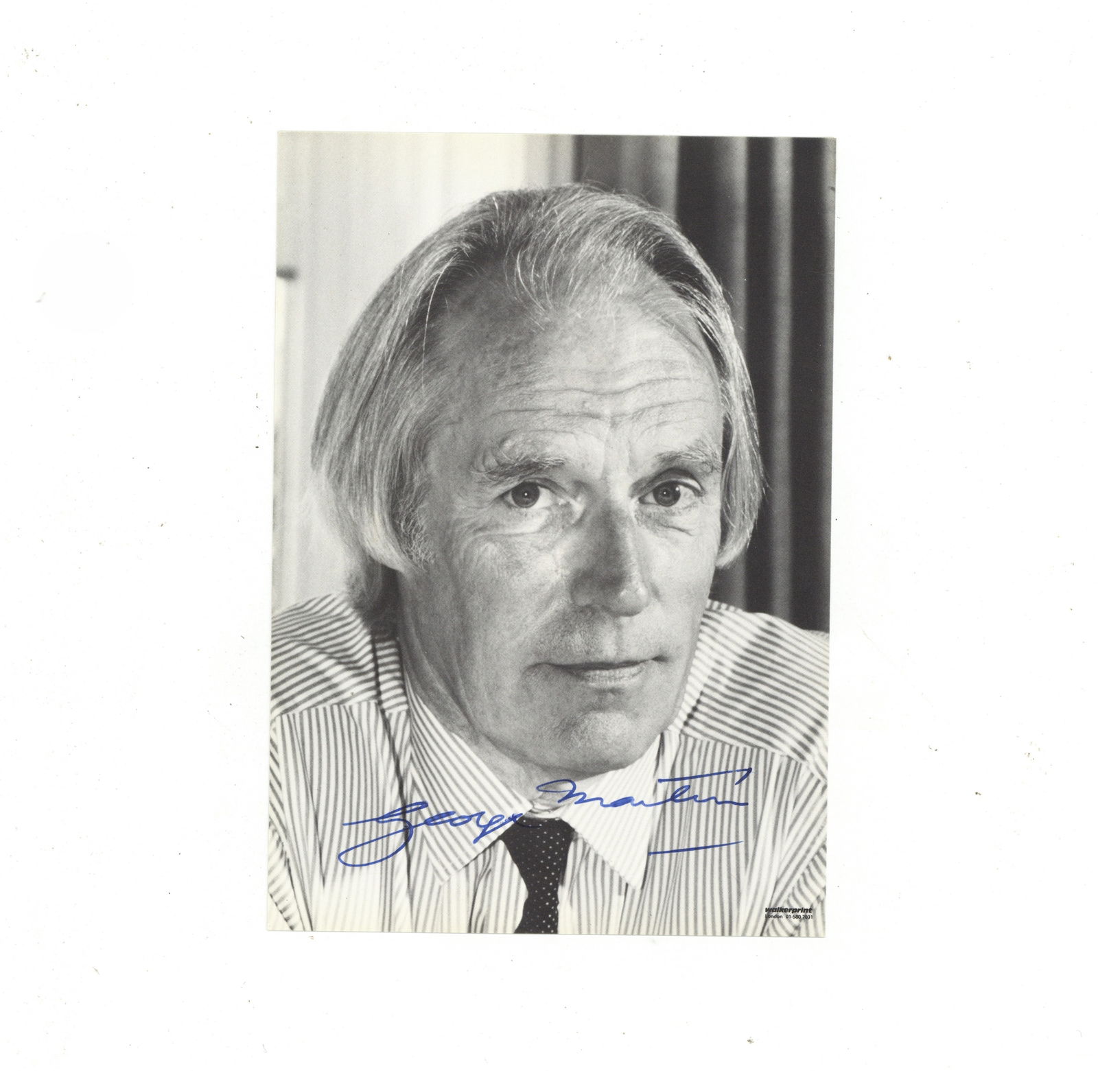 Martin (George) Signed photograph: Martin (George) Signed photograph Black and white, head and shoulders photograph on cardstock paper, signed in blue ink, in very good condition. Dimensions:7 x 5"/ 17.7 x 12.6cm