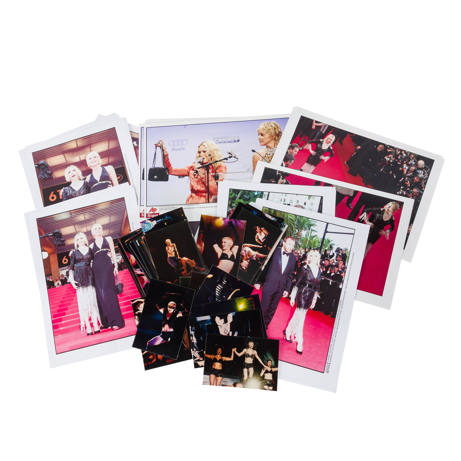 Madonna Collection of unsigned press photographs: Madonna Collection of unsigned press photographs The photographs mostly taken during red carpets events, 1980s-1990s, also including a group of candid photographs taken during a concert, in fine