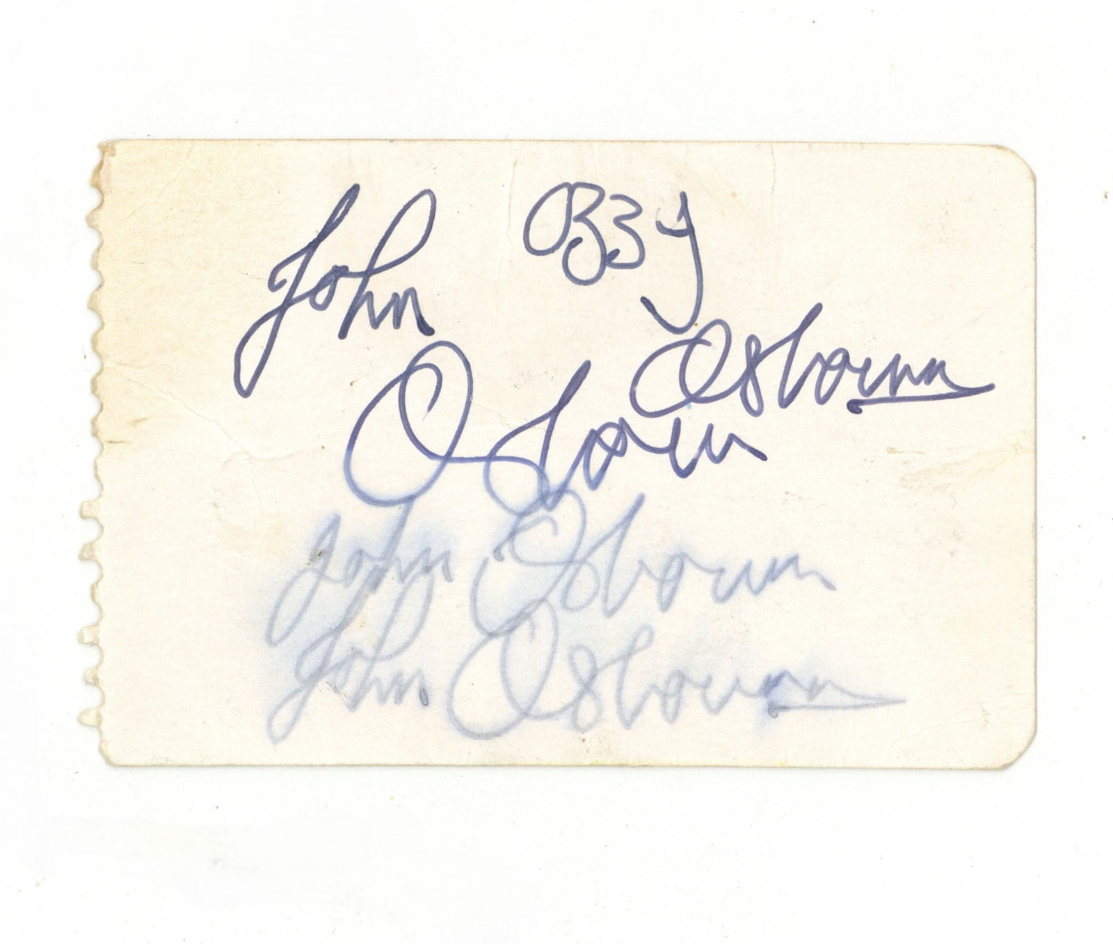 Osbourne (Ozzy) Signed card: Osbourne (Ozzy) Signed card Off-white card featuring multiple signature attempts by Ozzy Osbourne, who signed three times as 'John Osbourne' and once as Ozzy, some discolouration and handling wear. 