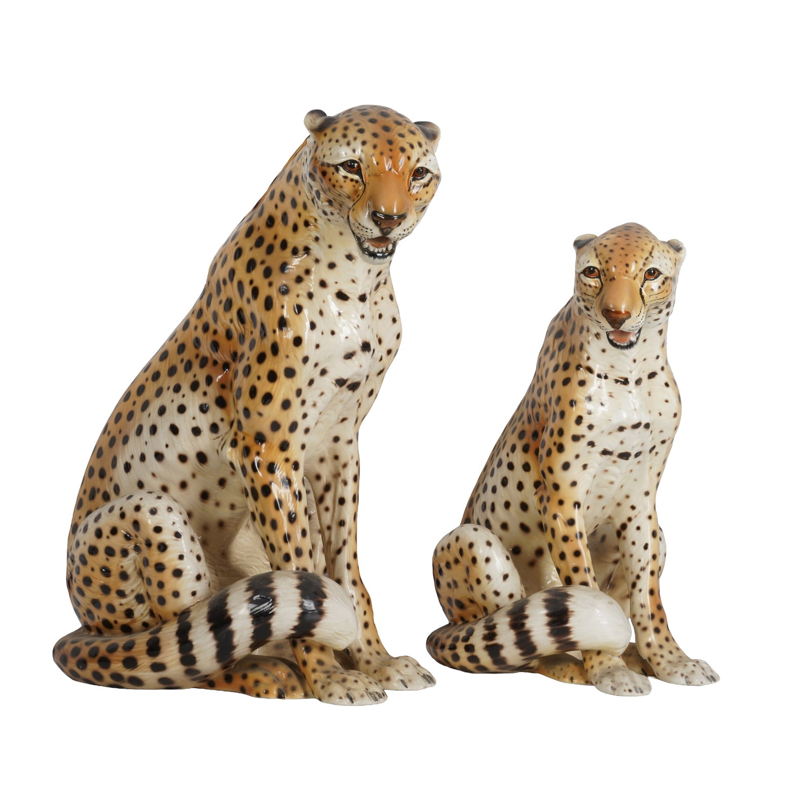 Giovanni Ronzan (Italian 1906-1974) Pair of Hollywood Regency style models of a Cheetah, model no. 1: Giovanni Ronzan (Italian 1906-1974) Pair of Hollywood Regency style models of a Cheetah, model no. 1454 Mid to late 20th century Faience glazed ceramic Underside painted 'MADE IN ITALY', model number