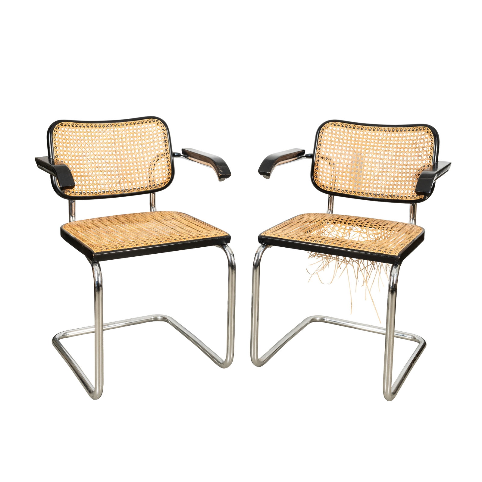Marcel Breuer (Hungarian-American 1902-1981) for Knoll International Pair of 'Cesca' Armchairs: Marcel Breuer (Hungarian-American 1902-1981) for Knoll International Pair of 'Cesca' Armchairs Ebonised wood, chrome, rattan Applied Knoll International label to underside 79cm x 57cm x 59cm (damages)