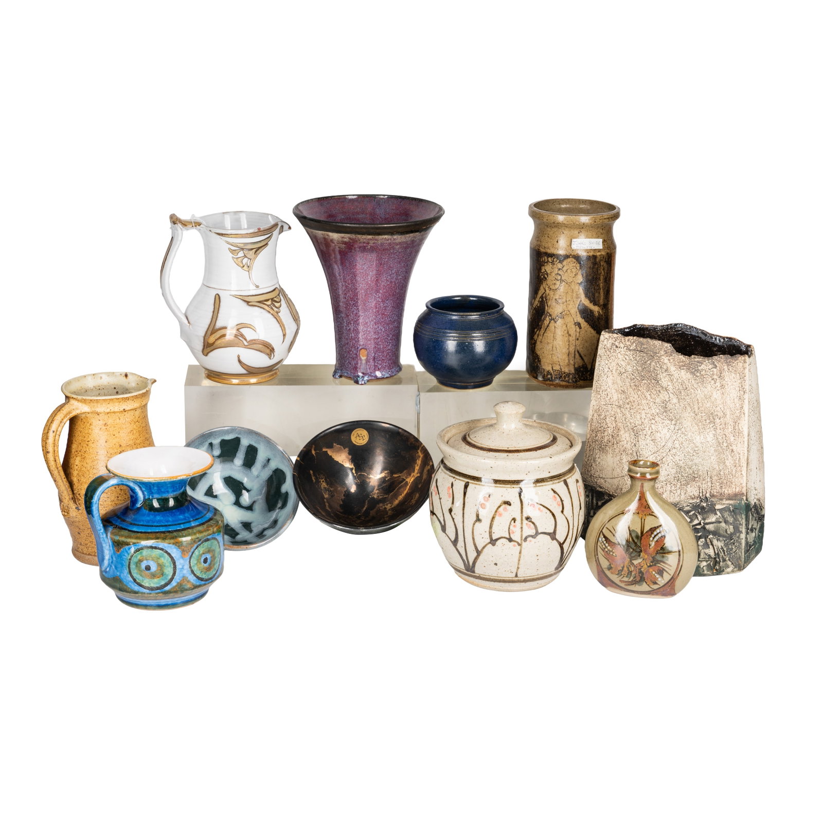 Various studio and contemporary ceramics Alan Caiger-Smith, Tony Laverick, Bitossi, Gouda and others: Various studio and contemporary ceramics Alan Caiger-Smith, Tony Laverick, Bitossi, Gouda and others To include: An Alan Caiger-Smith jug in white with lustrous gilt decoration (chips to rim), 18cm hi