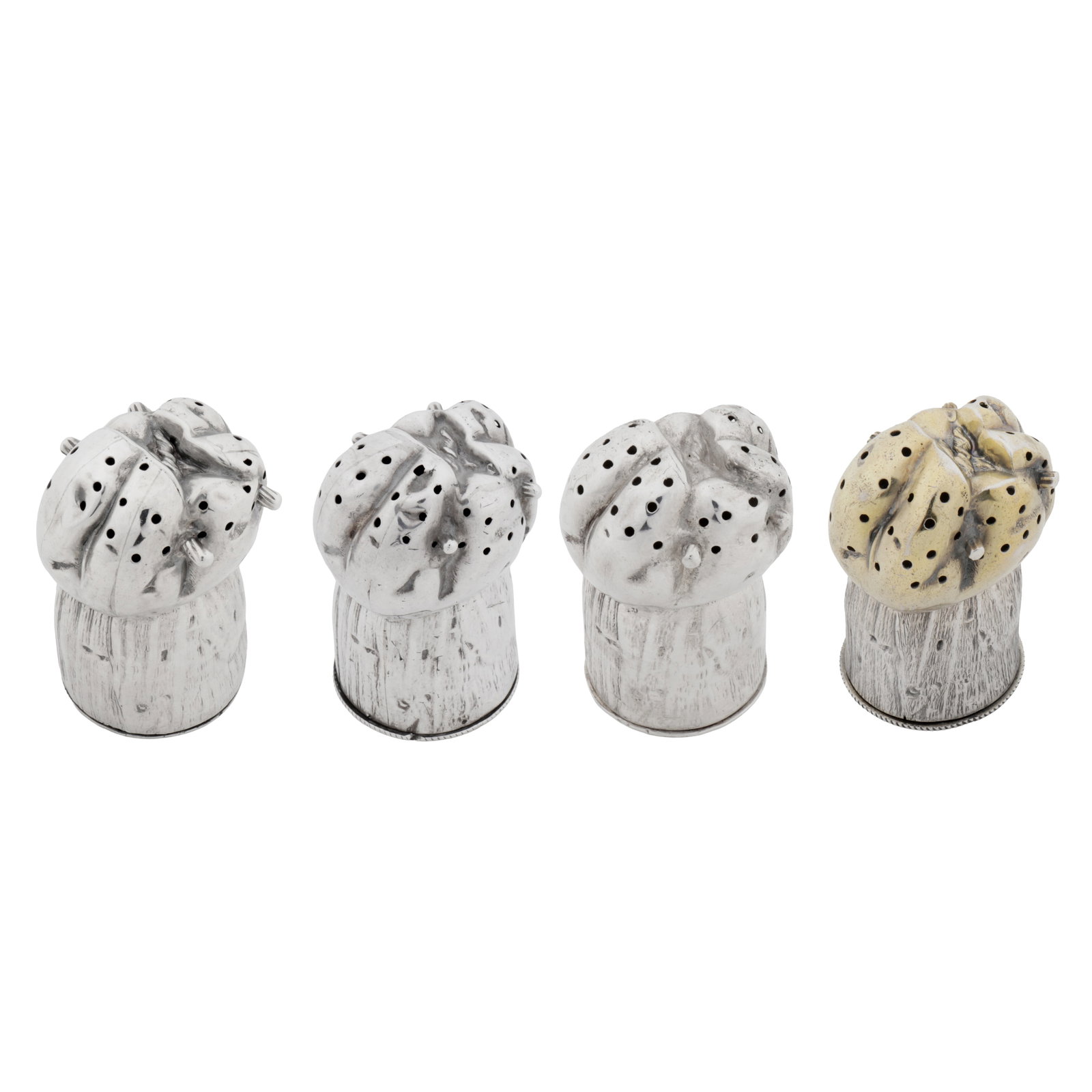 Sheffield 1879 by Henry Wilkinson and Co A set of four Victorian novelty sterling silver condiments: Each formed as champagne corks, with screw thread base. Two for pepper, two for salt. One with gilt interior, another with gilt interior and top section. Each fully and part-marked, two with registere