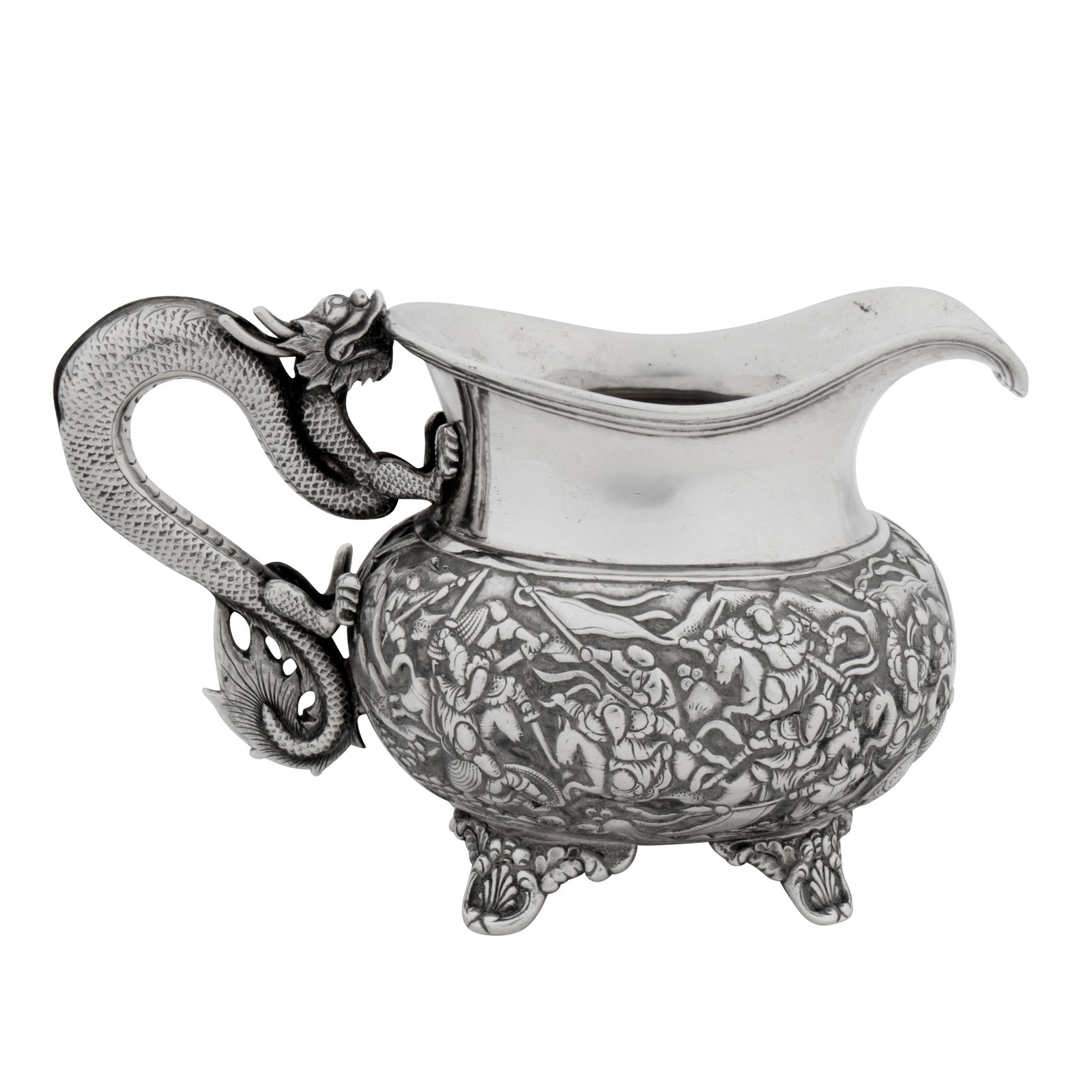 Canton circa 1860 by Shan, retailed by Dak Hing A mid-19th century Chinese export silver milk jug: Qing dynasty, of compressed circular form raised upon four anthemion and scroll bracket feet, the handle formed as a Chinese dragon with cut sheet frills and a wire horns. The body with chased decorat