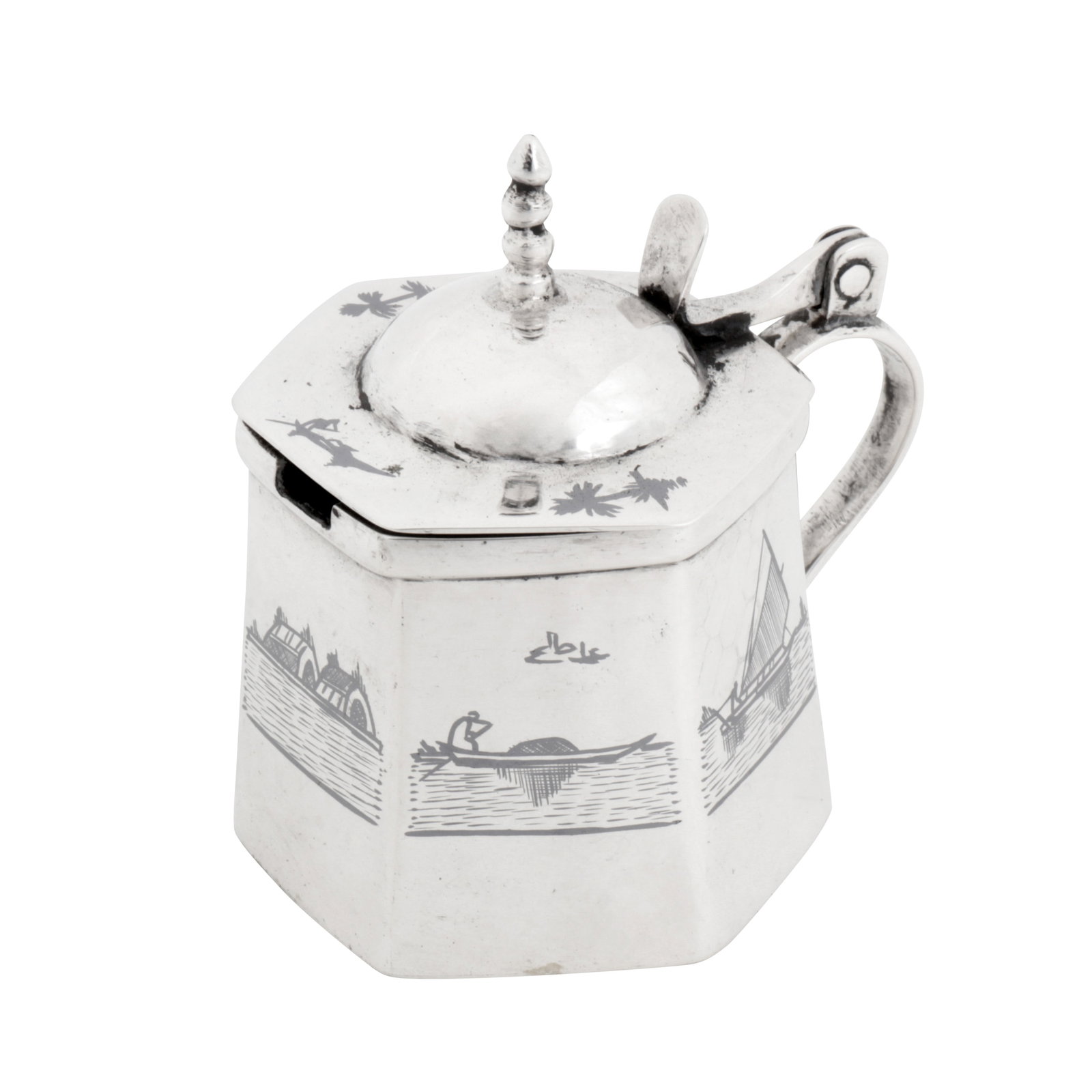 Omara circa 1930 signed Salih An early 20th century Iraqi silver and niello mustard pot: Of tapering hexagonal form with a hinged lid with various niello scenes. Signed to the side Omara, Salih. Length – 4.9 cm / 1.85 inches