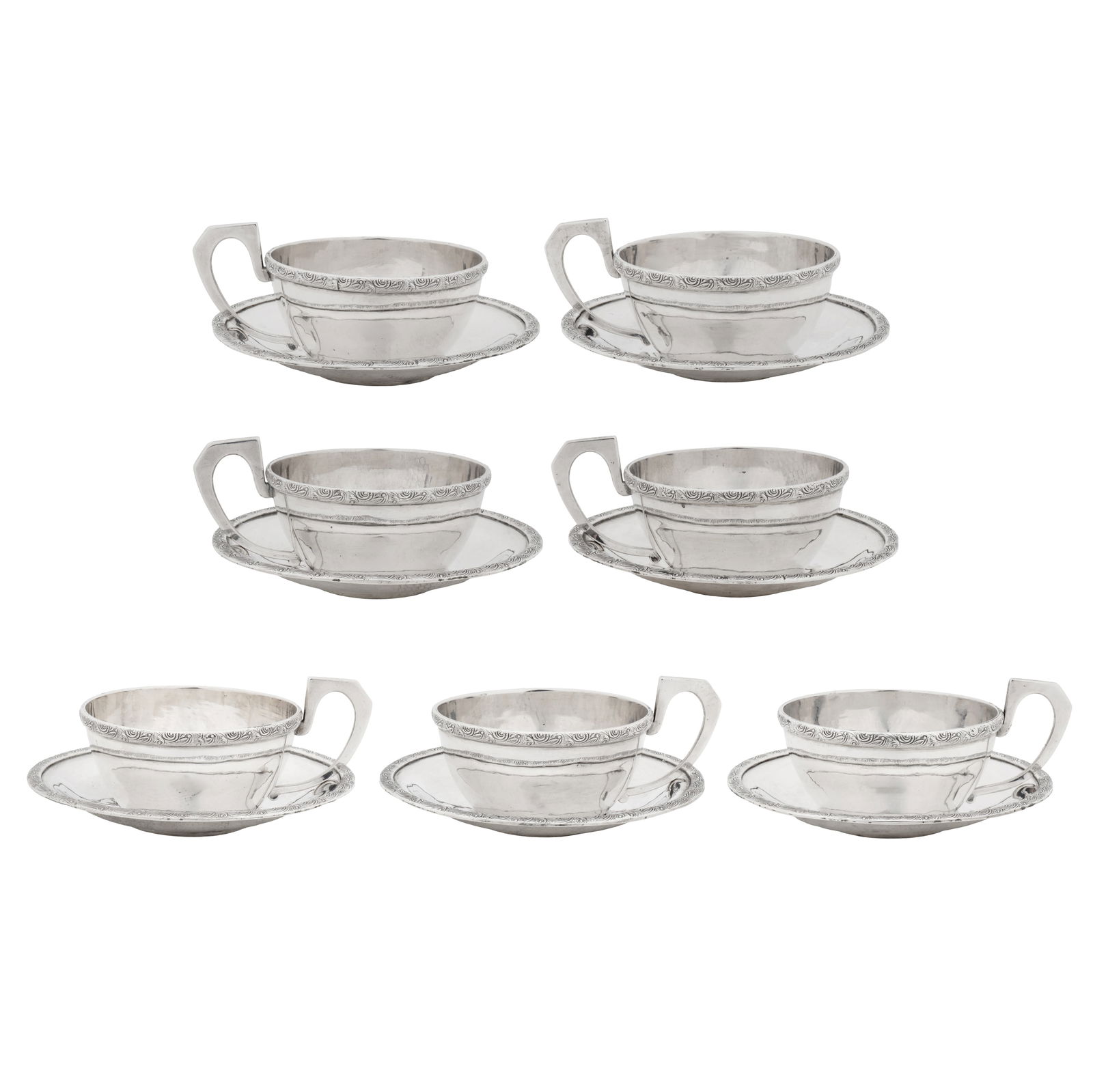 Iraqi circa 1950 A set of seven mid-20th century Iraqi silver cups and saucers (1 of 1)