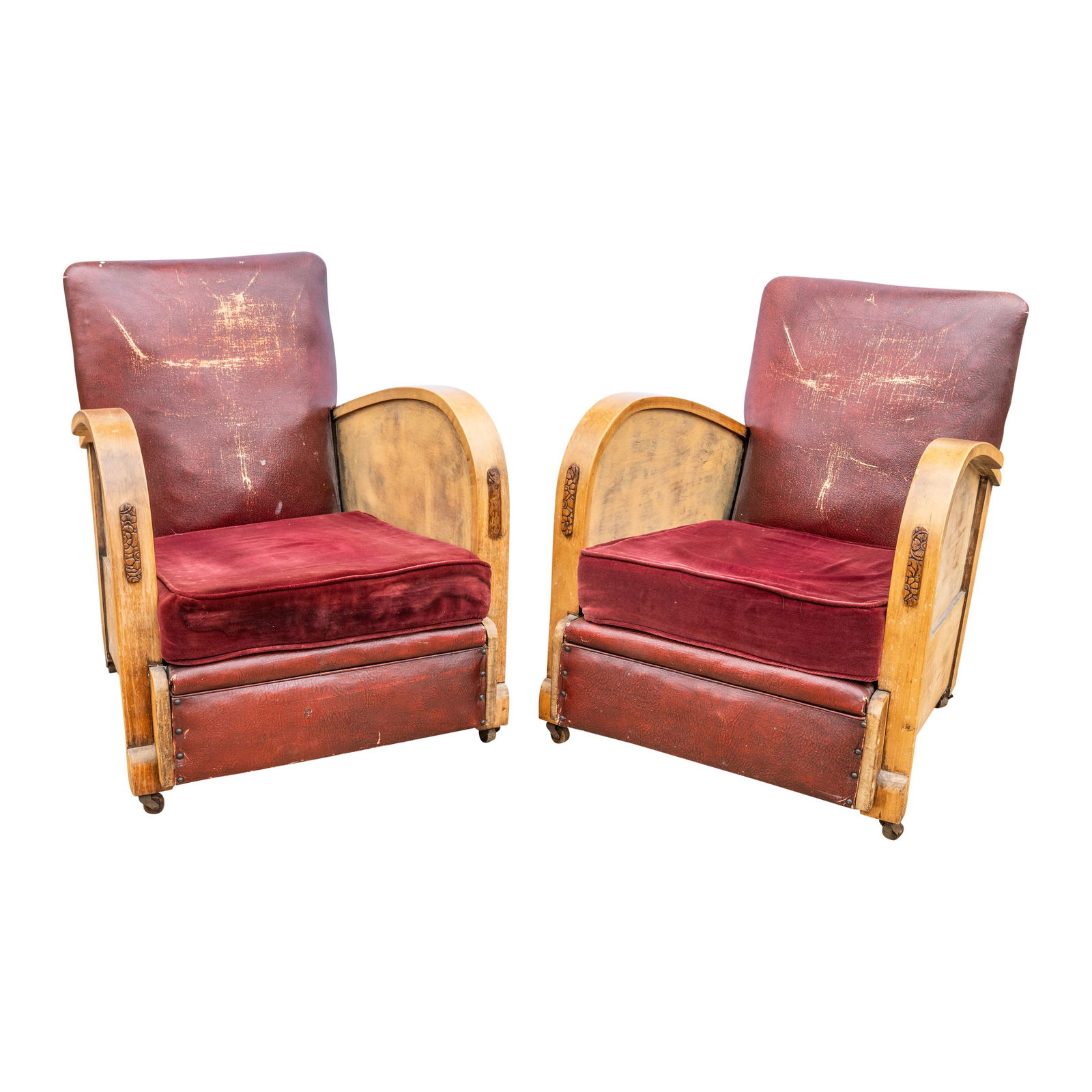 Art Deco, Europe Pair of club armchairs on castors: Art Deco, Europe Pair of club armchairs on castors Circa 1920sWood, leather, velvetUnmarked72cm high x 66cm wide x 78cm deep