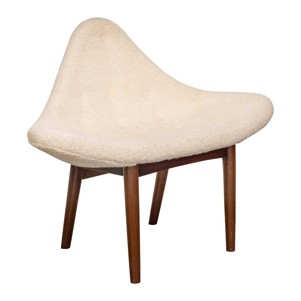 In the manner of Finn Juhl (Danish 1912-1989) Lounge Chair: In the manner of Finn Juhl (Danish 1912-1989) Lounge Chair 1980sBoucle , ebonised wood69cm high x 112cm high x 92cm deep