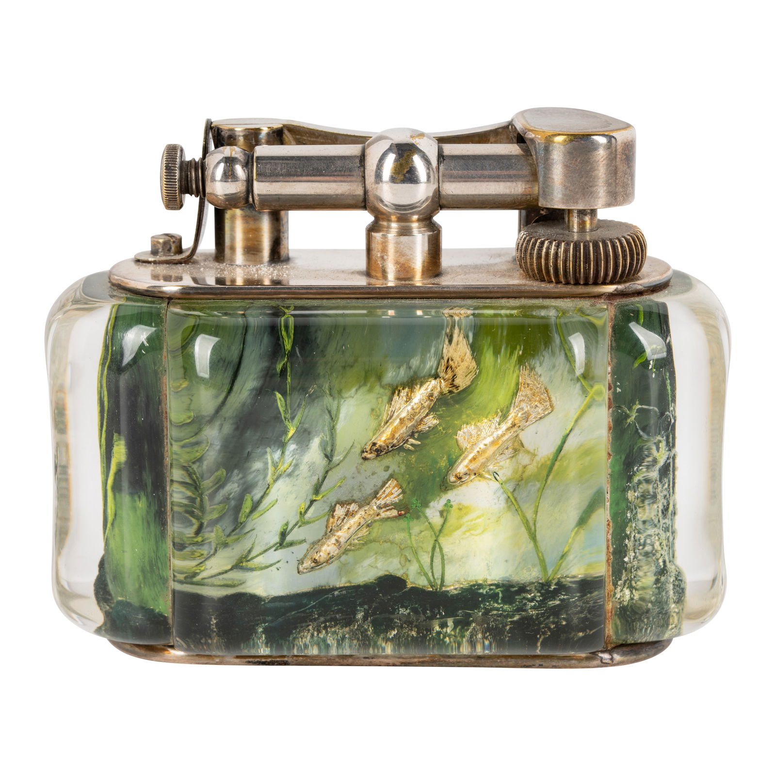 Alfred Dunhill (British 1872-1959) Half giant aquarium lighter: Alfred Dunhill (British 1872-1959) Half giant aquarium lighter Circa 1950sLucite, reverse intaglio, silver-plated brassMarked 'Dunhill' to the bridge8cm high x 10cm wide</
