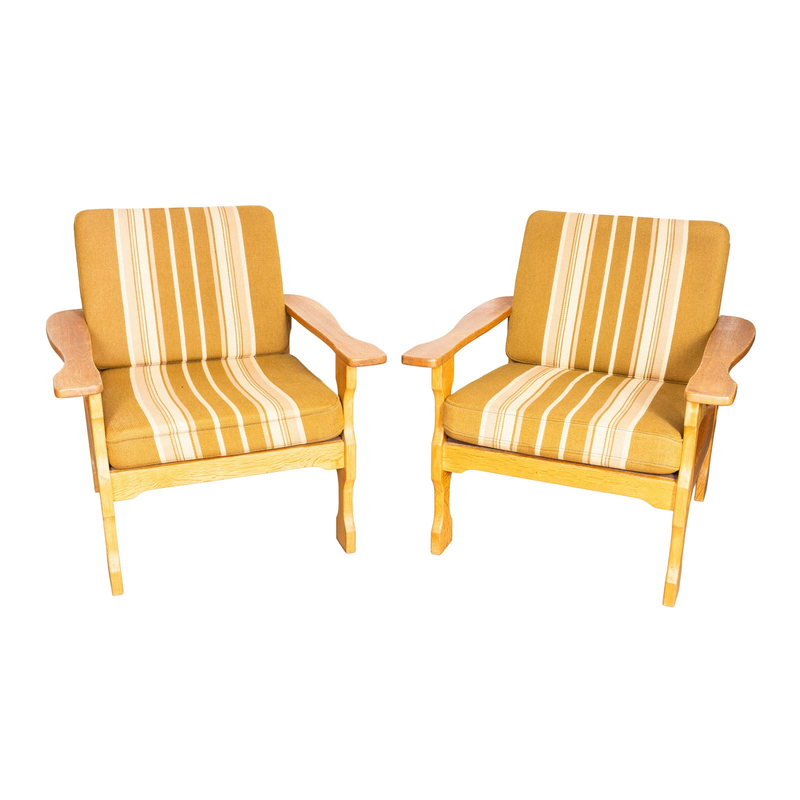In the Manner of Henning Kjærnulf (Danish, 20th Century) Pair of Armchairs: In the Manner of Henning Kjærnulf (Danish, 20th Century) Pair of Armchairs Mid-Century Oak, striped upholstery Unmarked 76cm high x 71.5cm wide x 79cm deep 