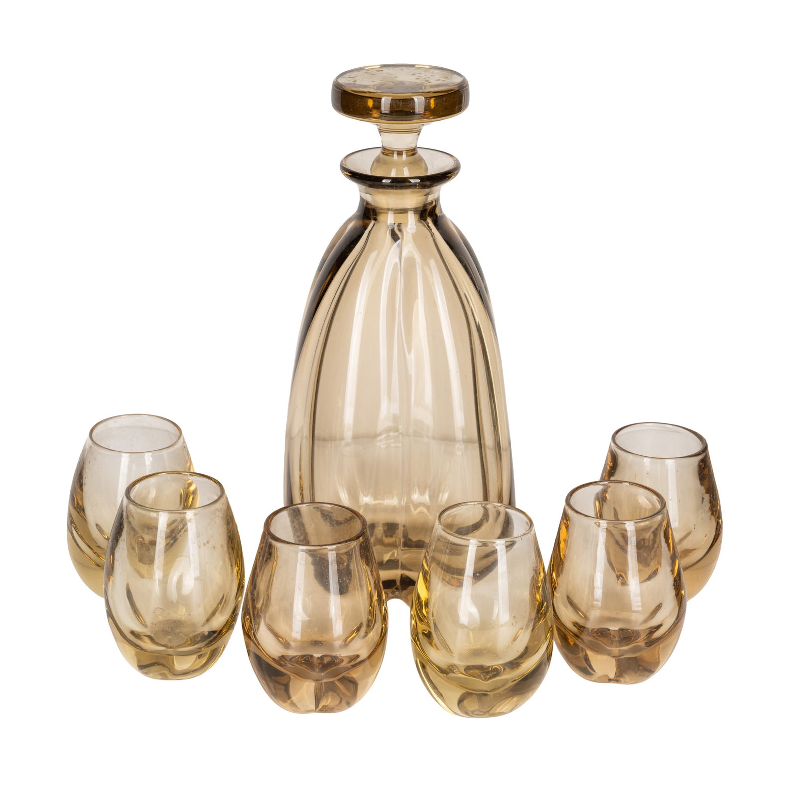Strombershyttan, Sweden Decanter with stopper and six glasses: Strombershyttan, Sweden Decanter with stopper and six glasses Circa 1950s Amber glass Unmarked Glasses: 8cm high, Decanter with stopper: 25cm