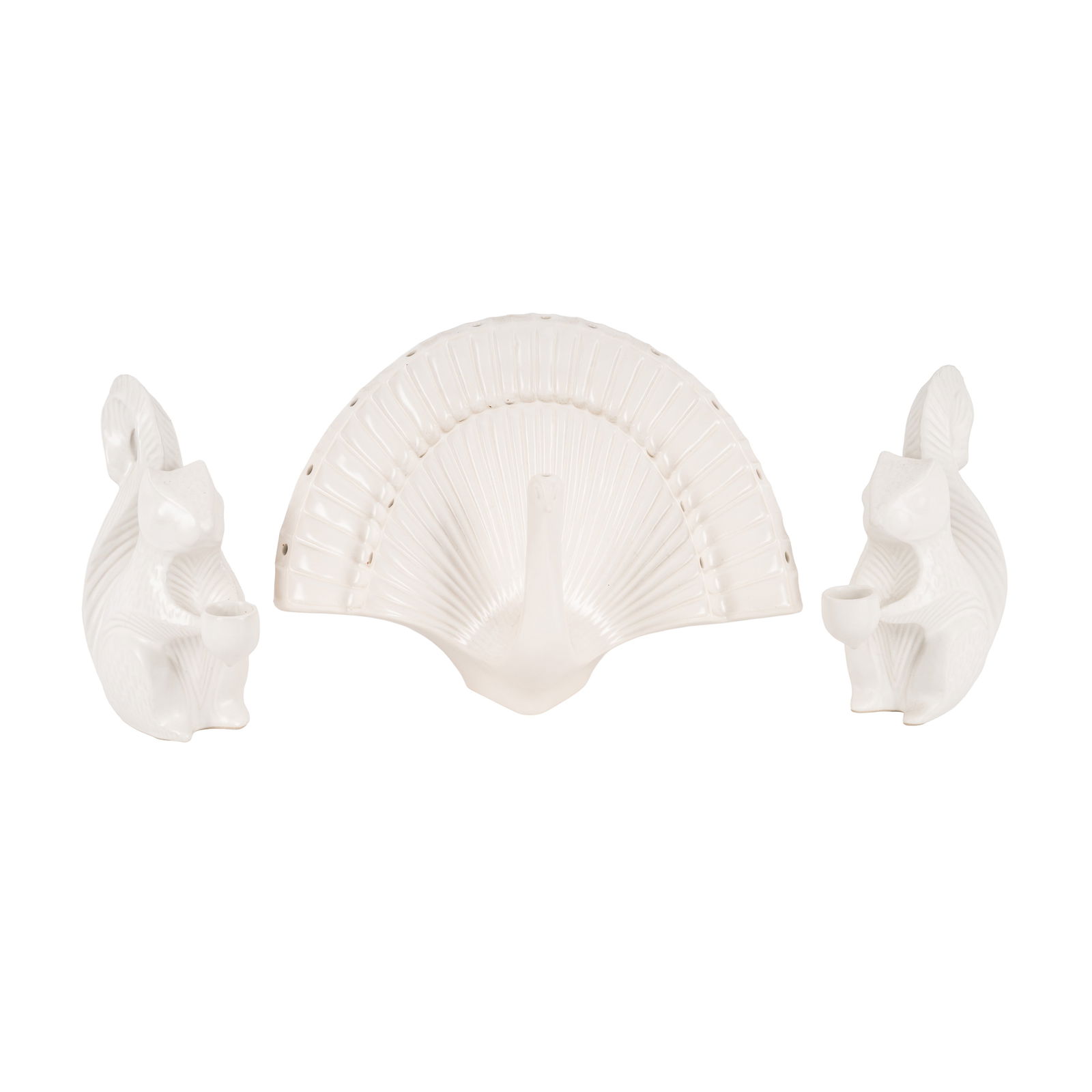 Jonathan Adler, American Group of Ceramic Animals: Jonathan Adler, American Group of Ceramic Animals To include a pair of Squirrel candlestick holders, and a peacockContemporaryStonewareEach with moulded marks to the baseSquirrels: 19cm high Peacock: