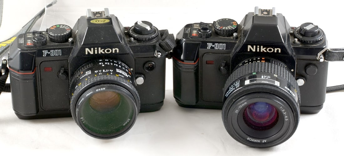 Group of Four Nikon Film SLR Cameras. Each with a Nikkor lens. - 3