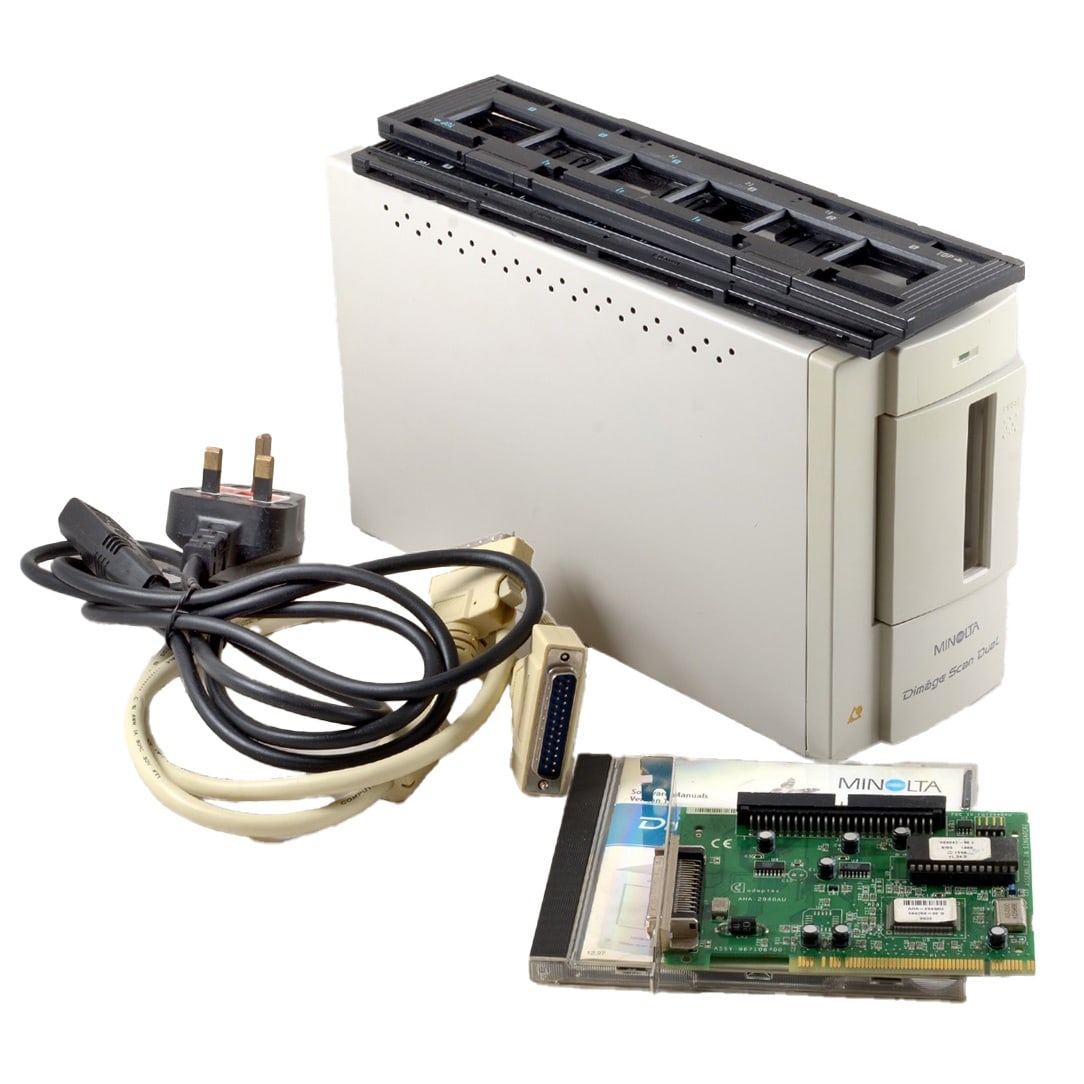 Minolta Dimage Dual 35mm Film Scanner.: Minolta Dimage Dual 35mm Film Scanner. Minolta Dimage Dual 35mm Film Scanner. With SSCI board, cables instruction etc. Looks complete but unable to test.