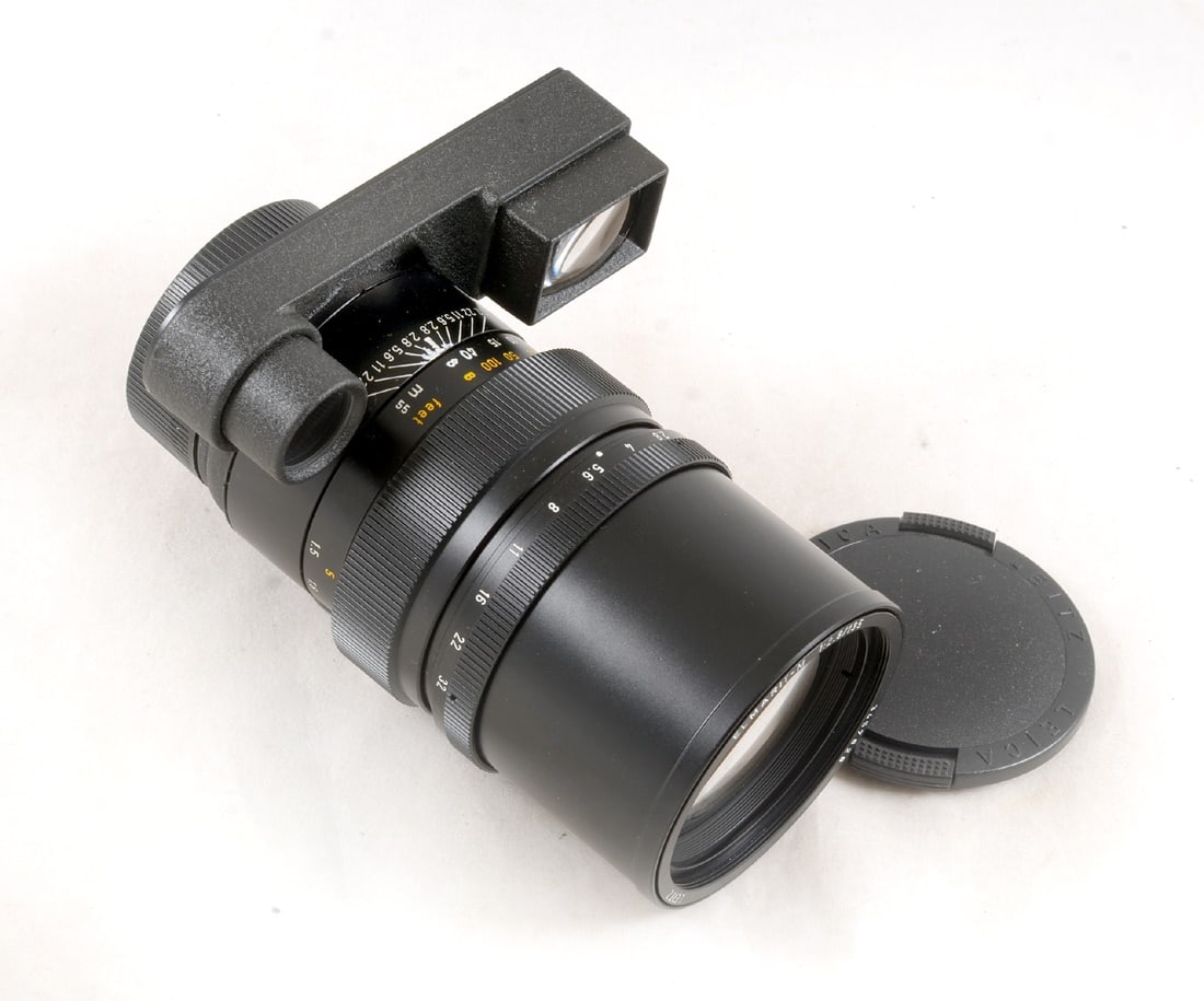 Leica Elmarit-M 135mm f2.8 Lens. #3457628.: Leica Elmarit-M 135mm f2.8 Lens. #3457628. Signs of light use but substantial separation to front element. With goggles.