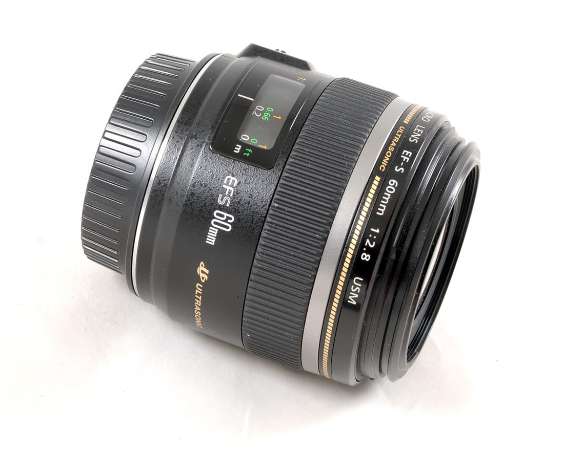 Canon EF-S 60mm f2.8 Macro Lens. With correct ET-67B lens hood. - 2