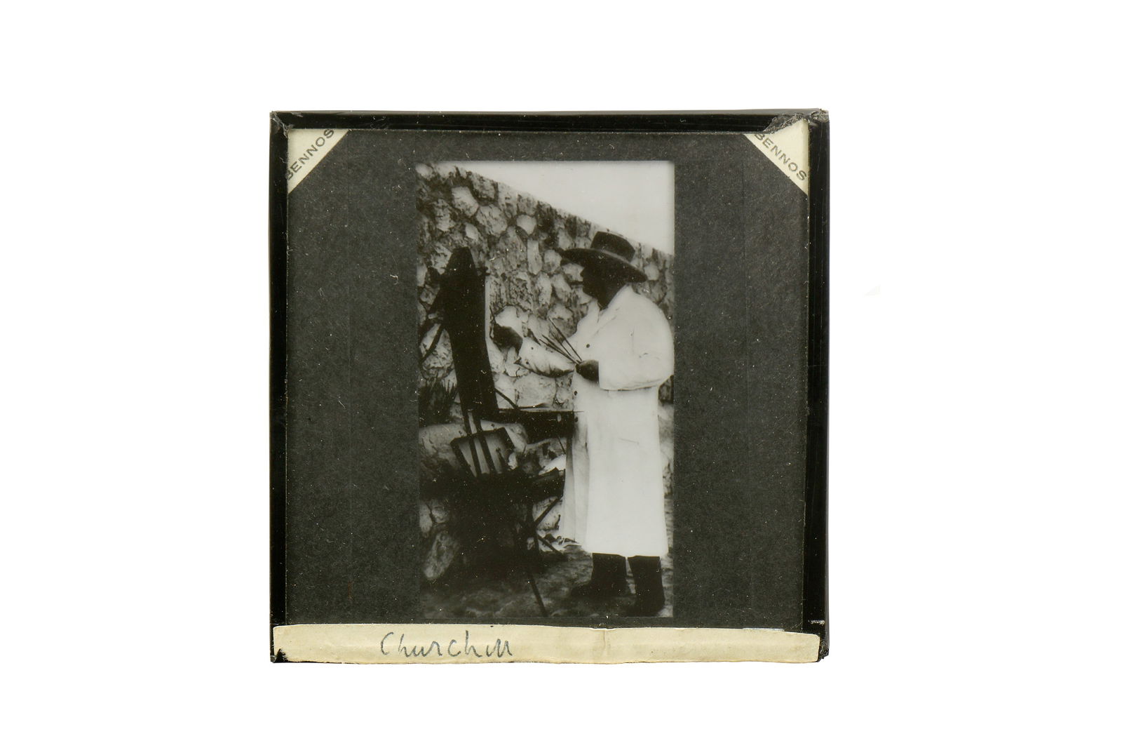 [Churchill (Winston Spencer)] Glass plate negative of Churchill painting in Miami, 1946: [Churchill (Winston Spencer)] Glass plate negative of Churchill painting in Miami, 1946 Glass plate negative of Winston Churchill standing in front of an easel with a painting, taken during his 1946