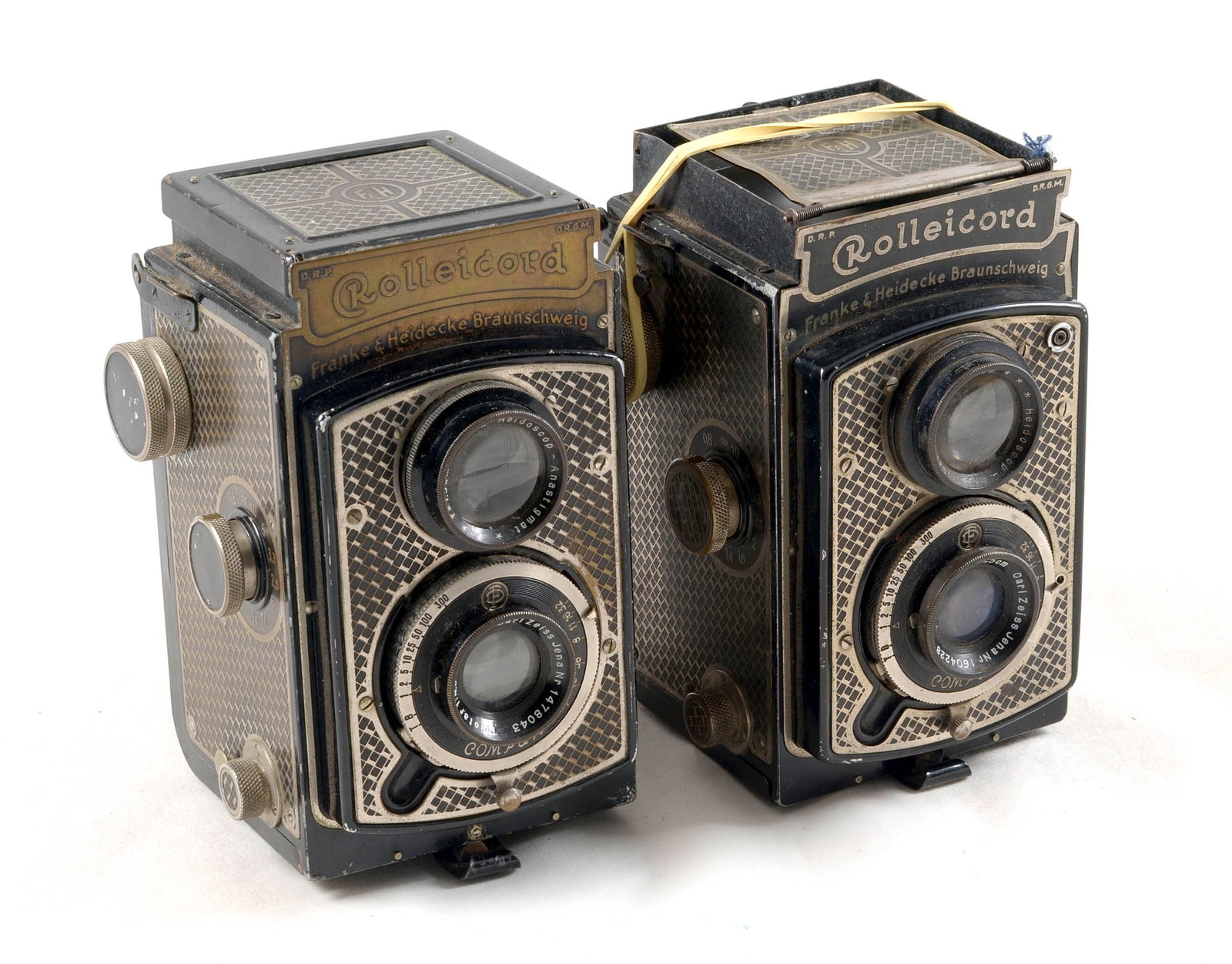 Pair of Art Deco Rolleicord I TLR Cameras. One with 3 sides of viewing hood missing. - 3