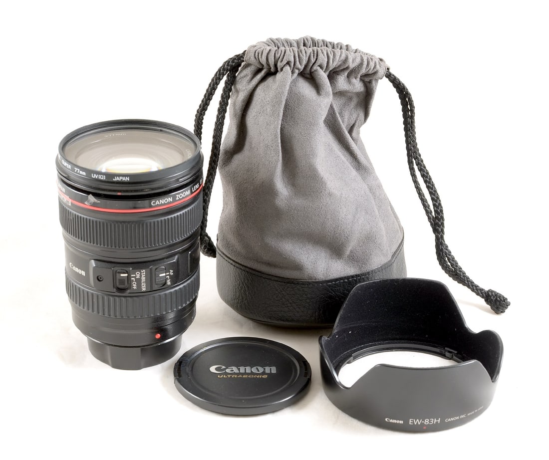 Canon EF 24-105mm f4 L IS Lens. With EW-83H hood and UV filter.: Canon EF 24-105mm f4 L IS Lens. With EW-83H hood and UV filter. #1202547. Red "L" trim loose, otherwise signs of normal use.