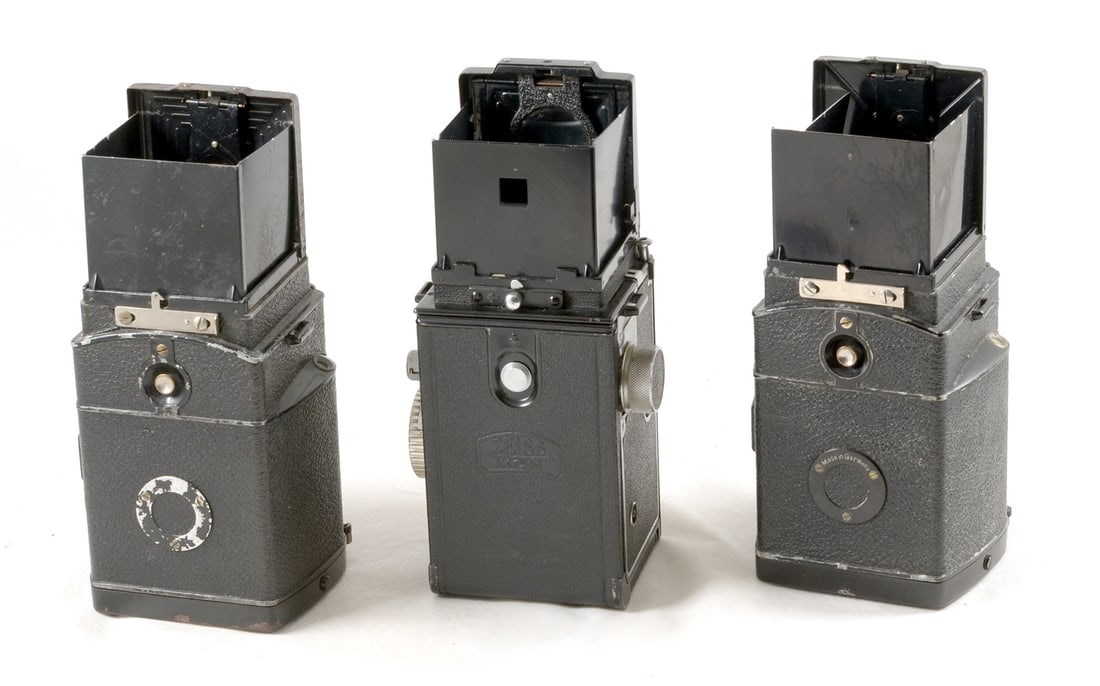 Three Zeiss Ikon Ikoflex TLRs. Two "coffee can" models and a Ikoflex Ia. - 2