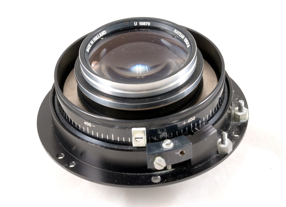 FAST De Oude Delf Rayxar E65 1.0 Lens.: FAST De Oude Delf Rayxar E65 1.0 Lens. A Fast Old Delf lens in a heavy-duty focussing mount. Signs of light use only, optics clear.