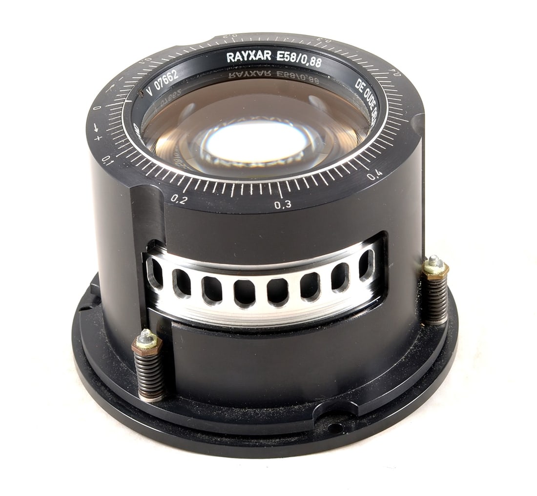Large Rayxar E58 0.88 Old Delft Lens.: Large Rayxar E58 0.88 Old Delft Lens. A FAST De Oude Delft lens in a heavy-duty (looks removable) mount. Signs of light use only, optics clear.