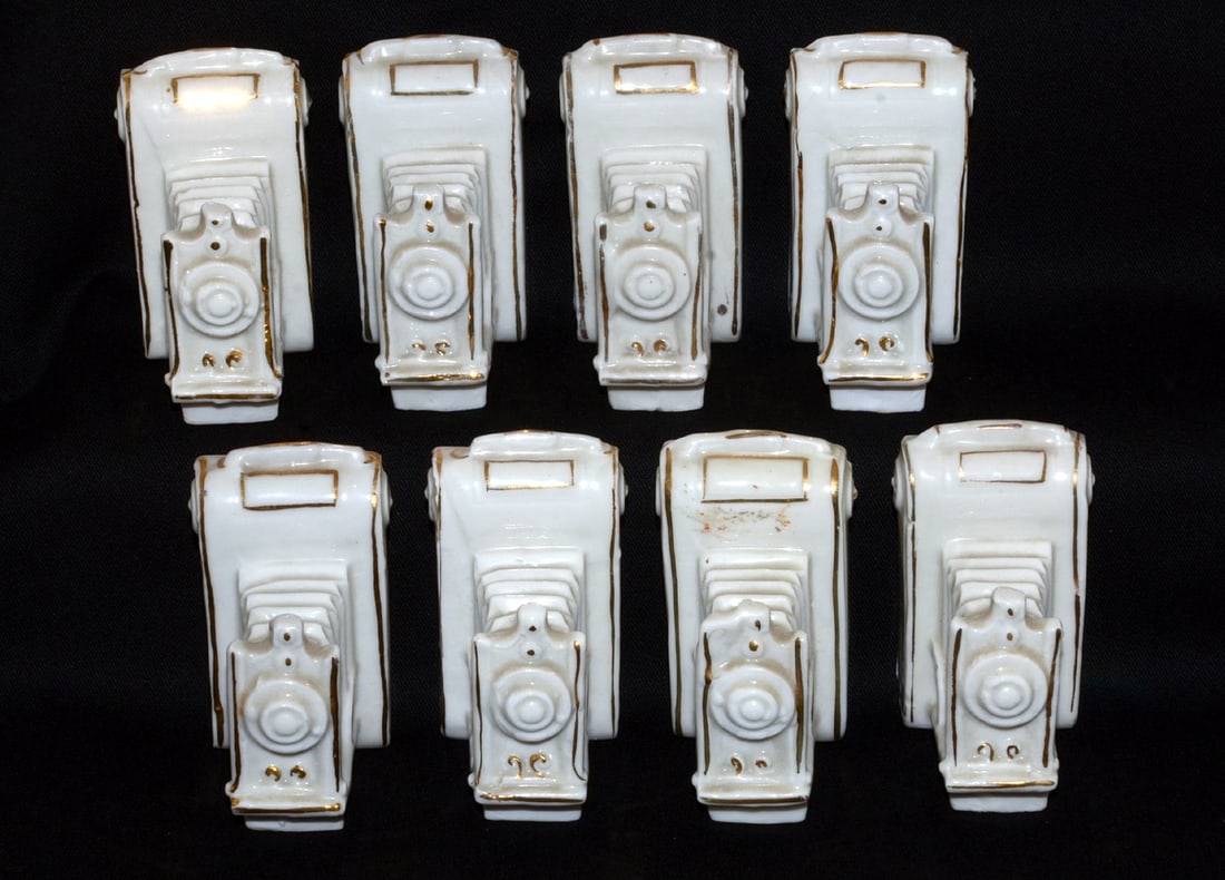 8 W H Goss Crested China Souvenirs. Each in the shape of an old bellows camera.: 8 W H Goss Crested China Souvenirs. Each in the shape of an old bellows camera. Souvenirs of London, Folkstone (2 different crests), Brighton, Margate, Liverpool, Portsmouth and Bognor. All in