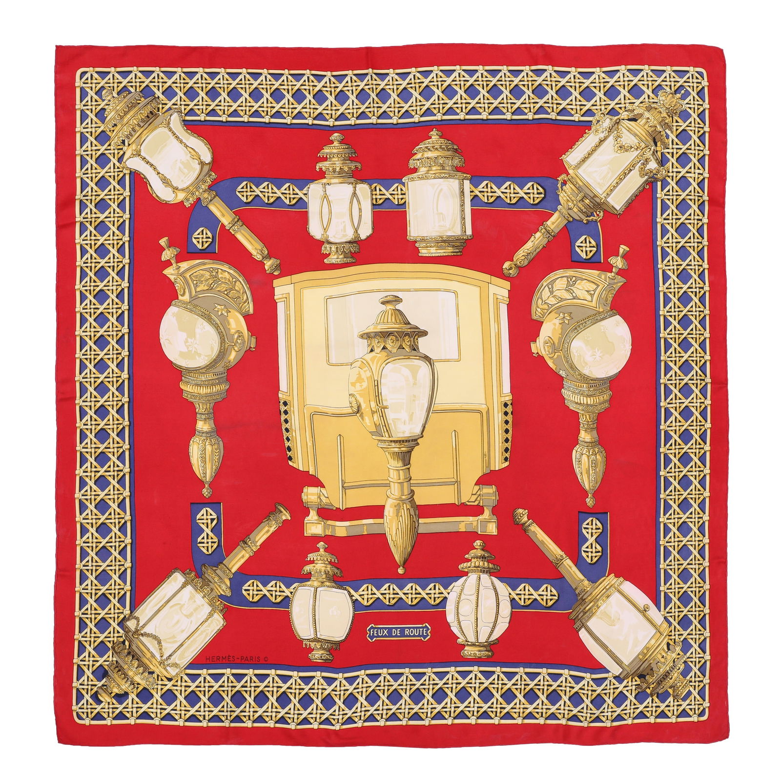 Hermes 'Feux De Route' Silk Scarf: Hermes 'Feux De Route' Silk Scarf designed in 1971 by Caty Latham, carriage lantern design, red gold and purple 88 x 88 cm Grade C Please log in to Chiswick Live account to view condition report