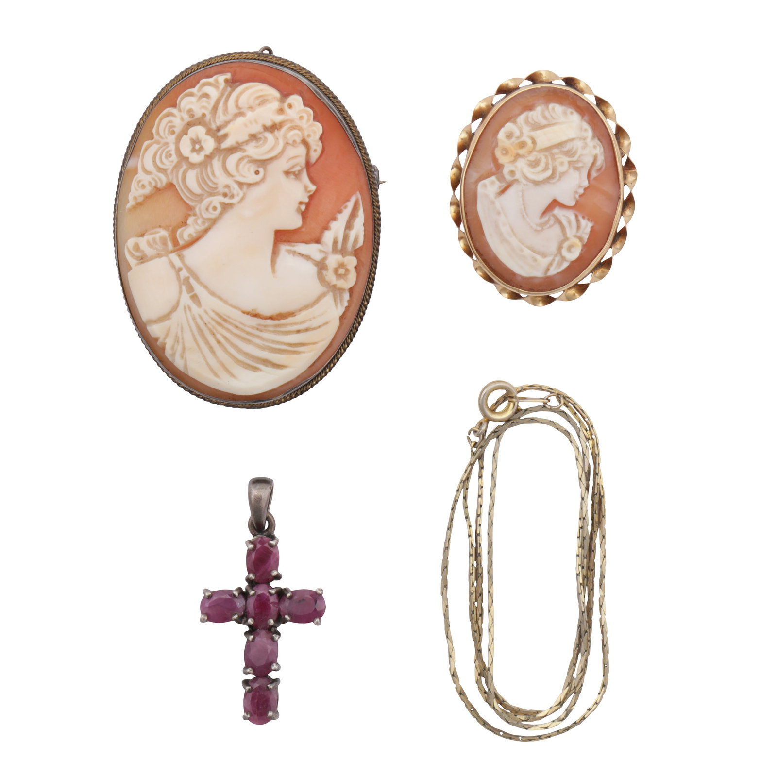 A collection of jewellery Yellow and white metal: A collection of jewellery Yellow and white metal To include two cameo brooches, each featuring a lady's profile looking right, a snake-chain necklace, unmarked and untested, and a ruby cross pendant,