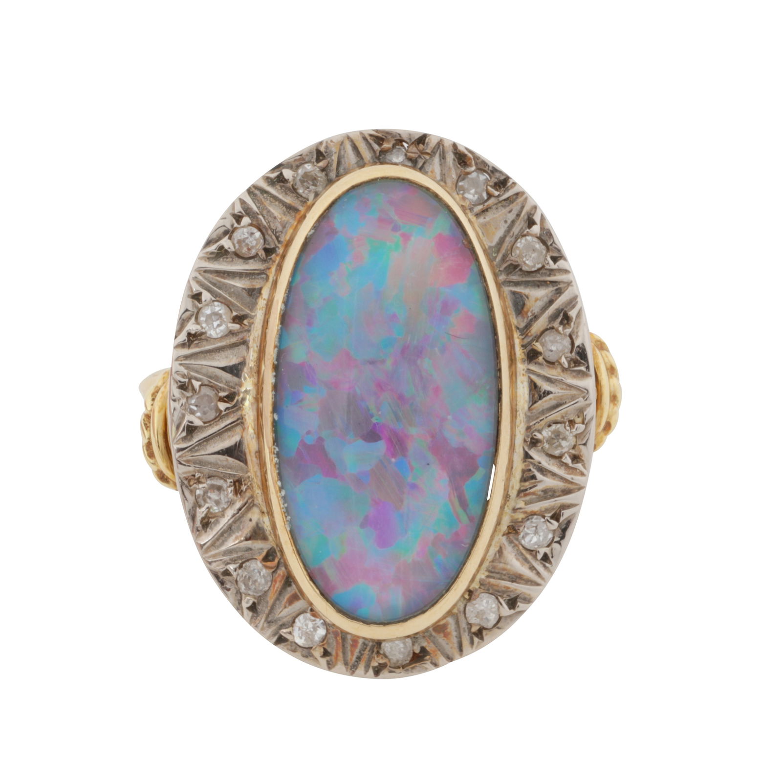 An opal triplet and diamond ring Yellow metal: An opal triplet and diamond ring Yellow metal Centrally collet-set with an oval-cut opal triplet cabochon, surrounded by a textured border set with single-cut diamonds, to tapered tapered shoulders