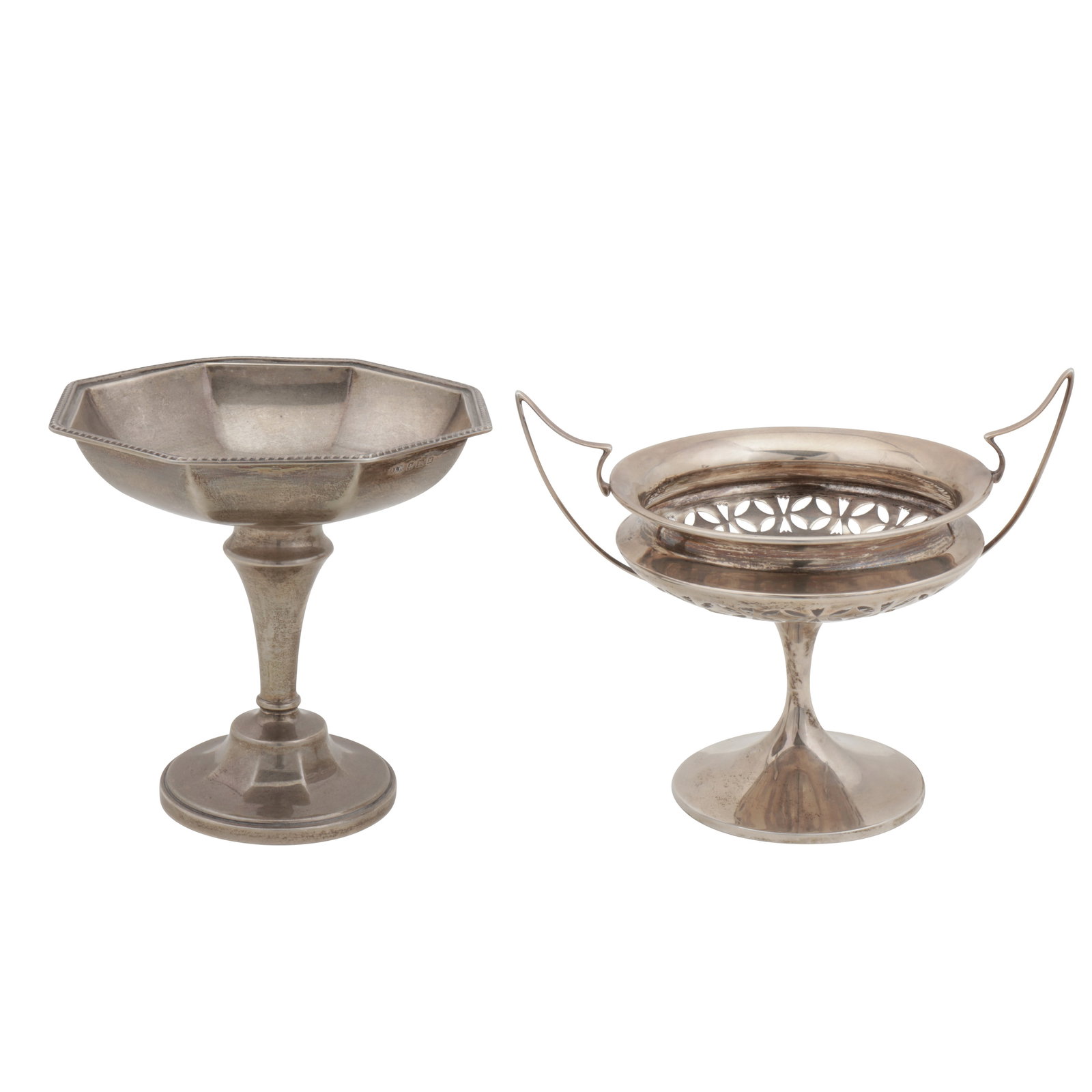 Birmingham 1909 by Jones & Crompton An Edwardian sterling silver twin handled comport/ tazza or pede: Birmingham 1909 by Jones & Crompton An Edwardian sterling silver twin handled comport/ tazza or pedestal fruit dish Of circular form with pierced circle and lozenge decoration upon a circular pedesta