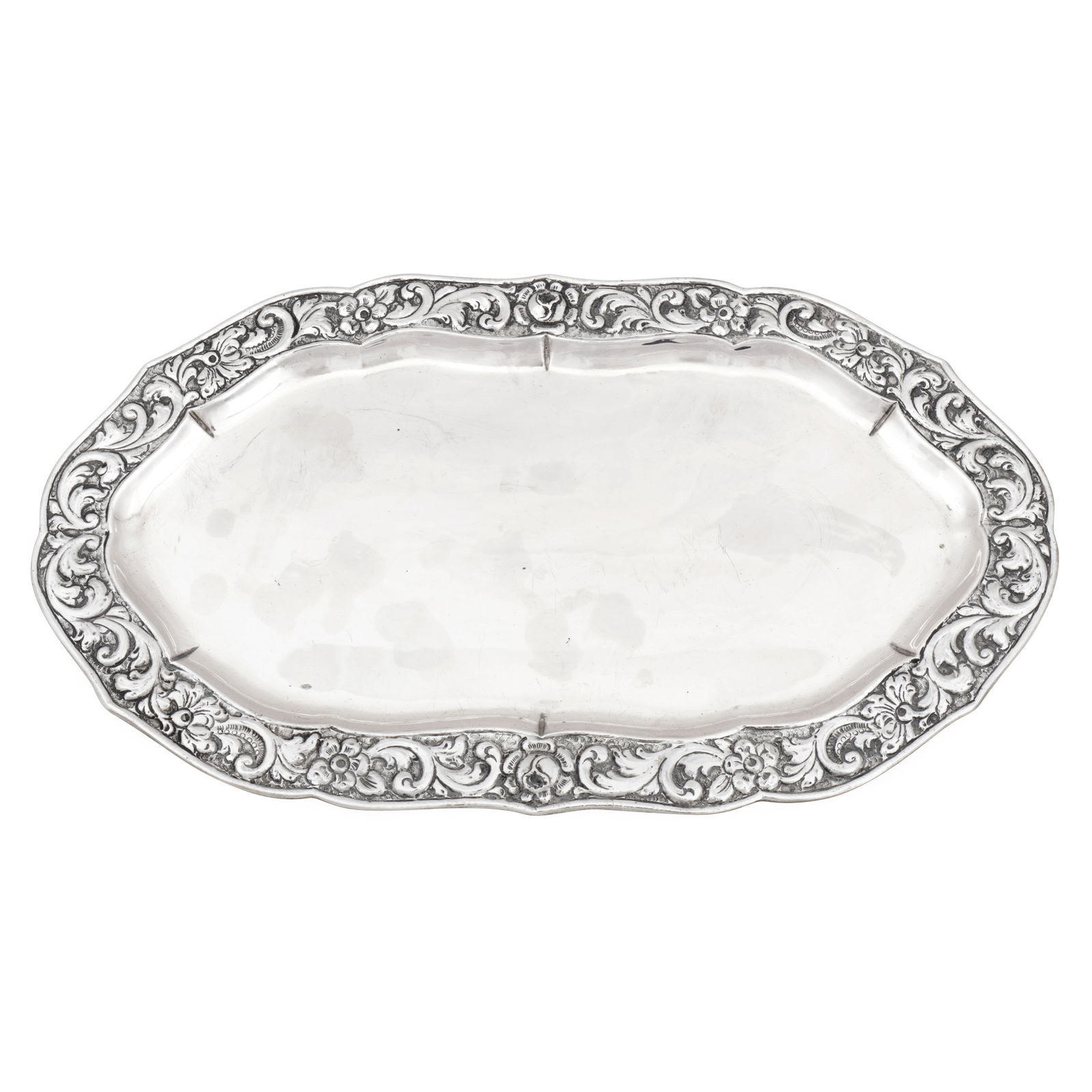 Turkish circa 1960 A mid-20th century 800 standard silver serving dish: Turkish circa 1960 A mid-20th century 800 standard silver serving dish Of shaped oval form with an embossed foliate rim. Marked C800. Length – 41.8 cm / 15.75 inches Weight – 779 grams
