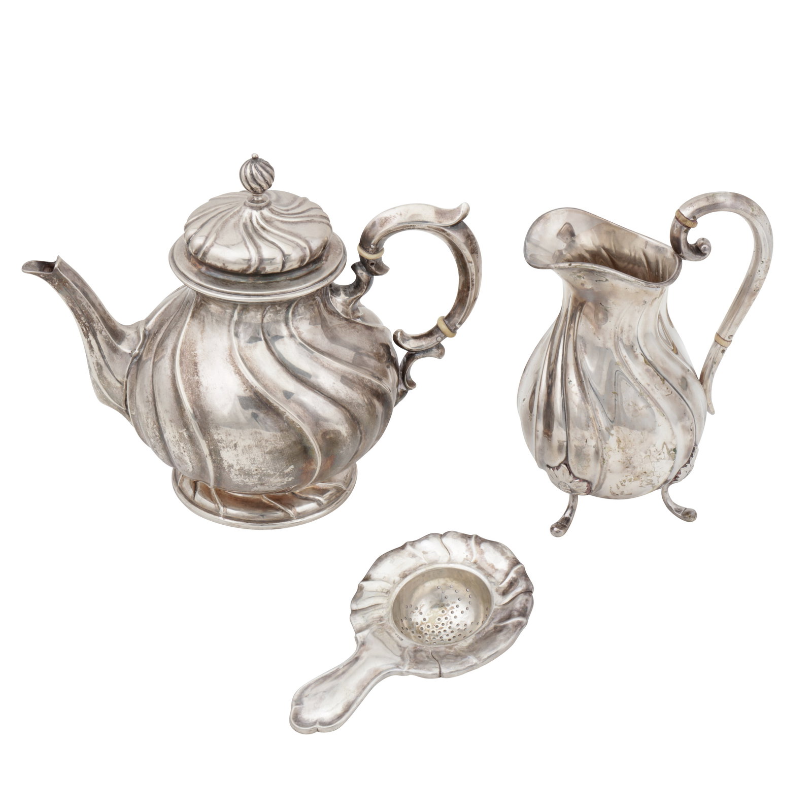 Copenhagen 1917, no maker’s mark An early 20th century Danish 826 standard silver milk jug: Copenhagen 1917, no maker’s mark An early 20th century Danish 826 standard silver milk jug Of baluster form upon four feet, the scroll handle with ivory insulators, engraved underneath.