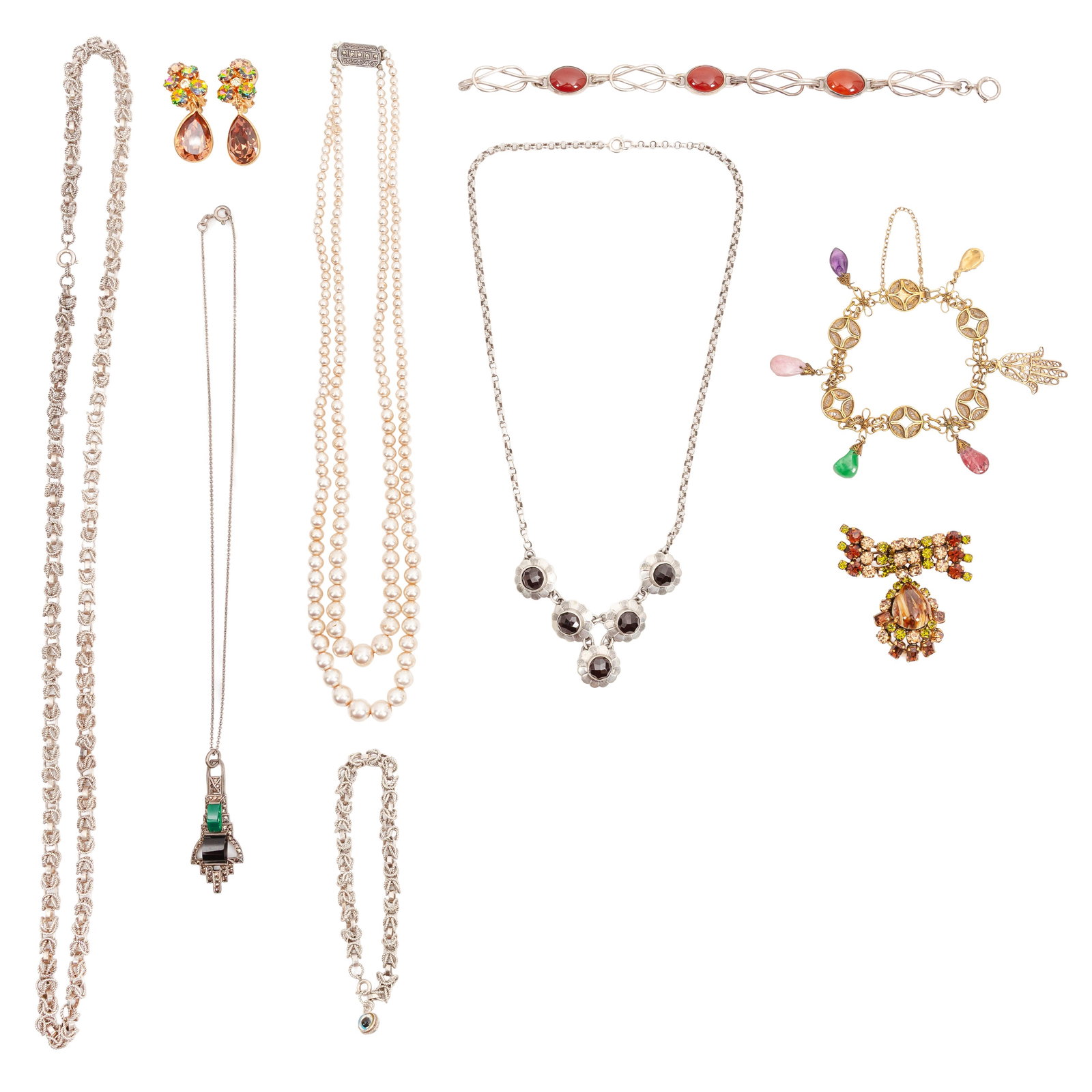 A group of silver and costume jewellery Yellow and white metal: A group of silver and costume jewellery Yellow and white metal To include necklaces, bracelets, and earrings, some set with gemstones such as carnelian, onyx, and seed pearls, some items stamped