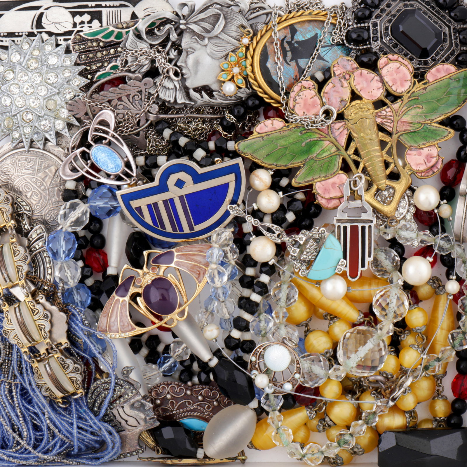 A collection of silver and costume jewellery Yellow and white metal: A collection of silver and costume jewellery Yellow and white metal To include necklaces, bracelets, brooches, earrings, pendants, and rings, some set with gemstones, some stamped silver, others