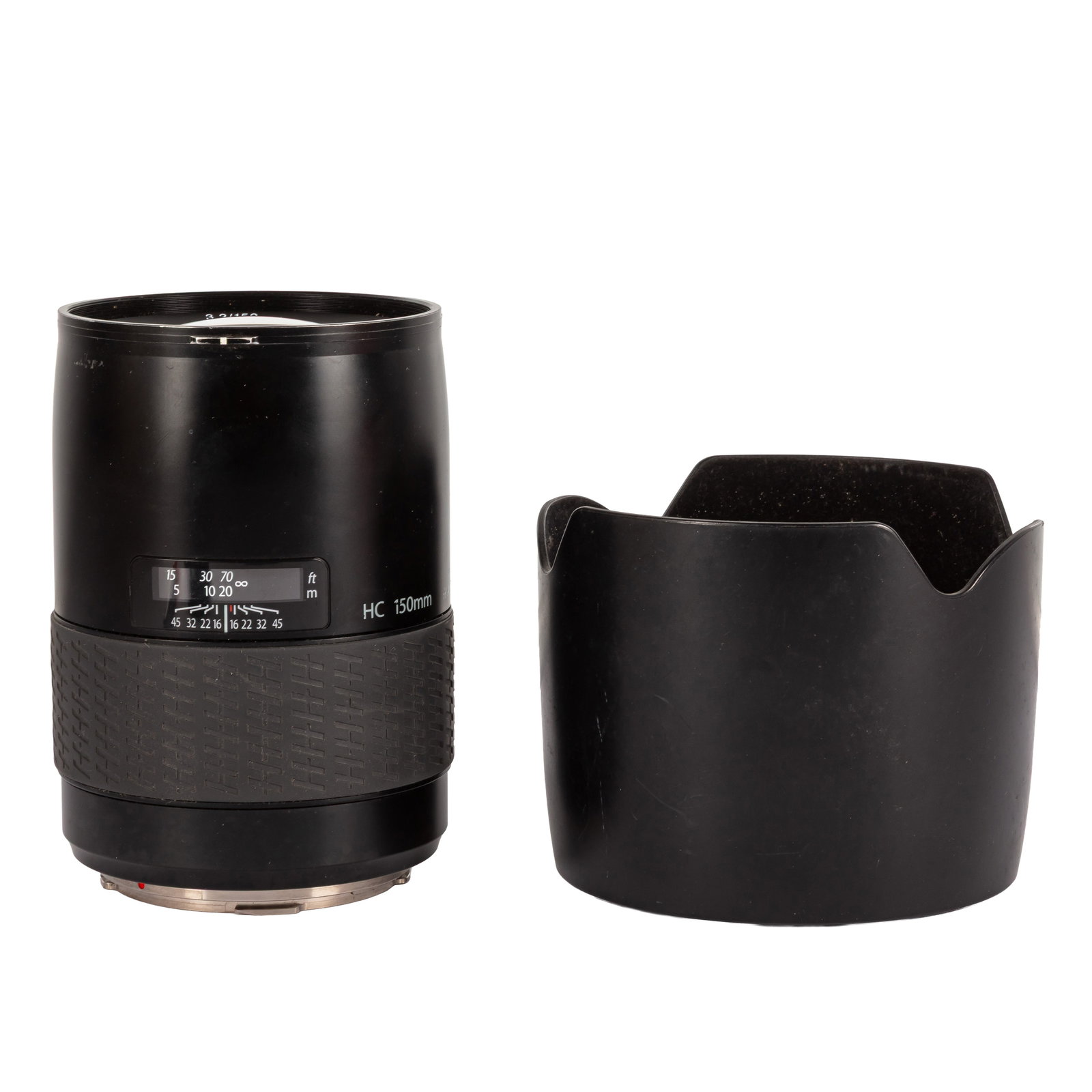 Hasselblad HC 150mm f/3.2 Medium Format Lens: Serial No: 7FSP10320 Body: G/VG - some cosmetic paint wear Optics: VG Notes: with maker's caps and lens hood