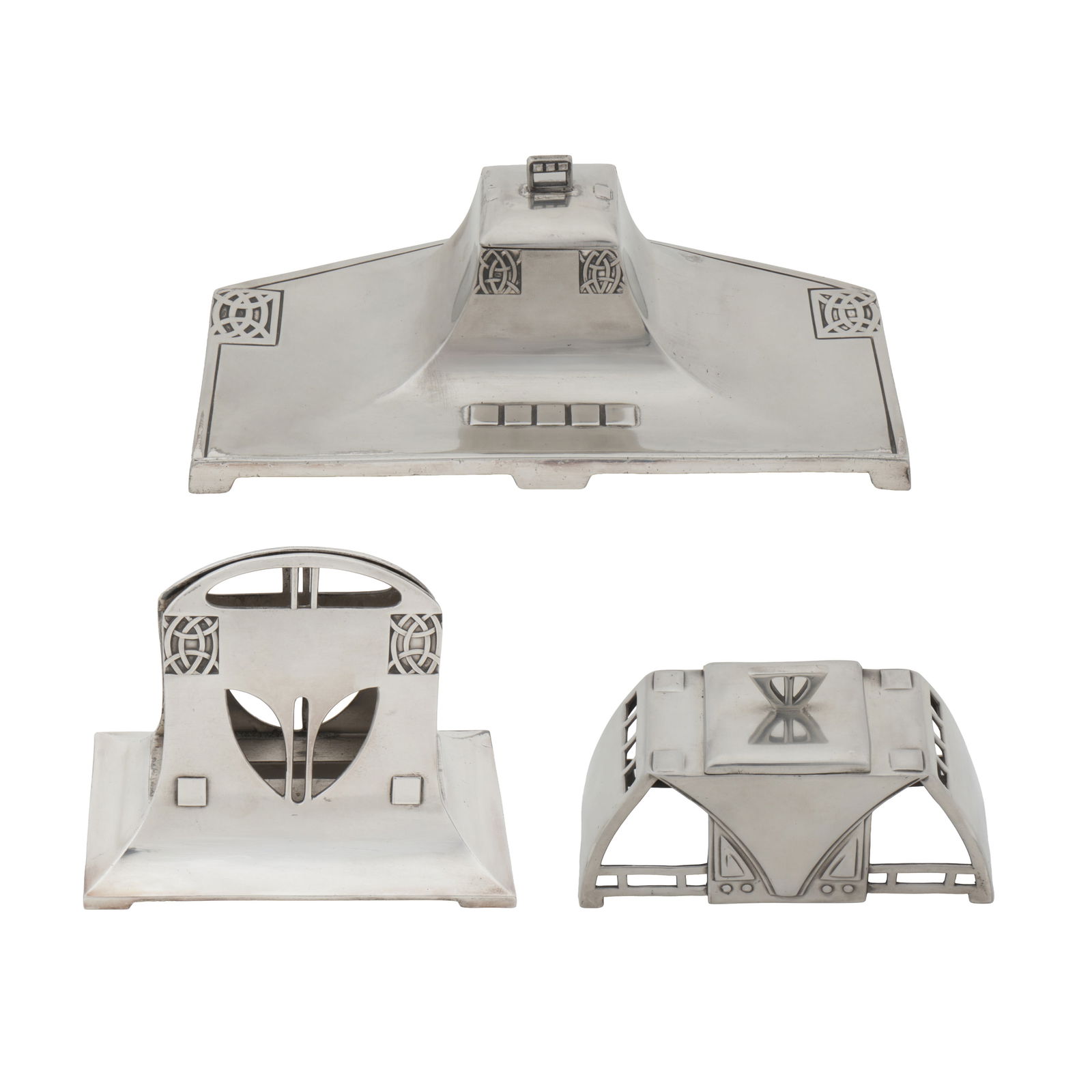 WMF, German A Secessionist style letter rack and two inkwells: Circa 1900 Pewter, glass liner to one inkwell Each stamped with WMF marks, Letter rack stamped model 120, Wide inkstand stamped 120K Letter rack: 11cm high, Domed inkwell: 7.5cm high, Inkstand: 20.5cm