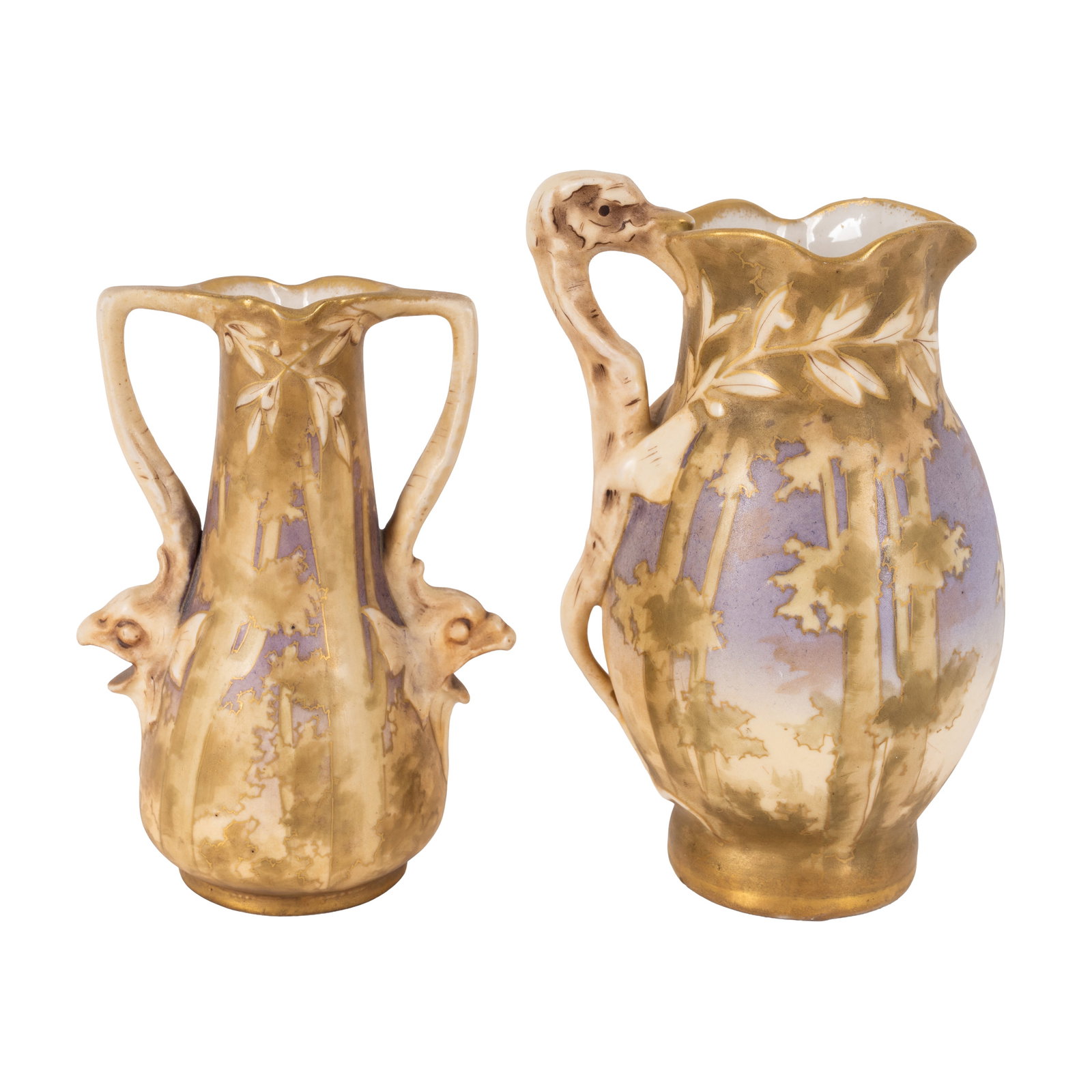 Riessner, Stellmacher & Kessel (Amphora), Turn Teplitz A vase and jug 'Saurians in the Forest': 1899-1900 Porcelain Printed mark for 'Riessner, Stellmacher & Kessel, Turn Teplitz 1892-1905', along with impressed crown and 'AMPHORA' mark Taller: 18cm high, smaller: 15.2cm high (2) Notes: Mini Mon