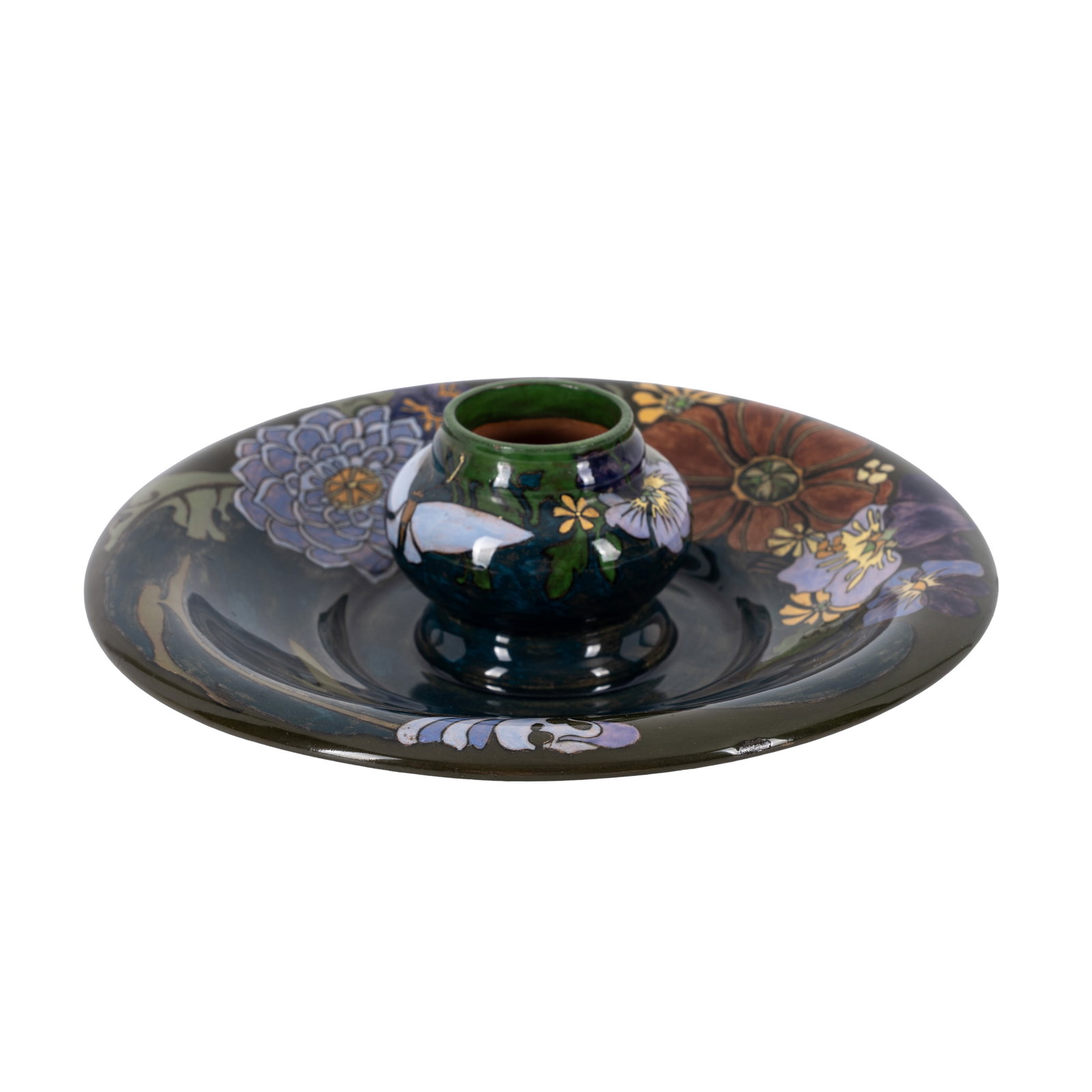 Rozenburg den Haag, Holland Inkwell decorated with flowers (lacking cover): 1907 Painted and glazed earthenware Underside with printed stork mark, painted date mark, model number and artists monogram 20cm diameter Provenance:Property of a private collector of Dutch Decorative