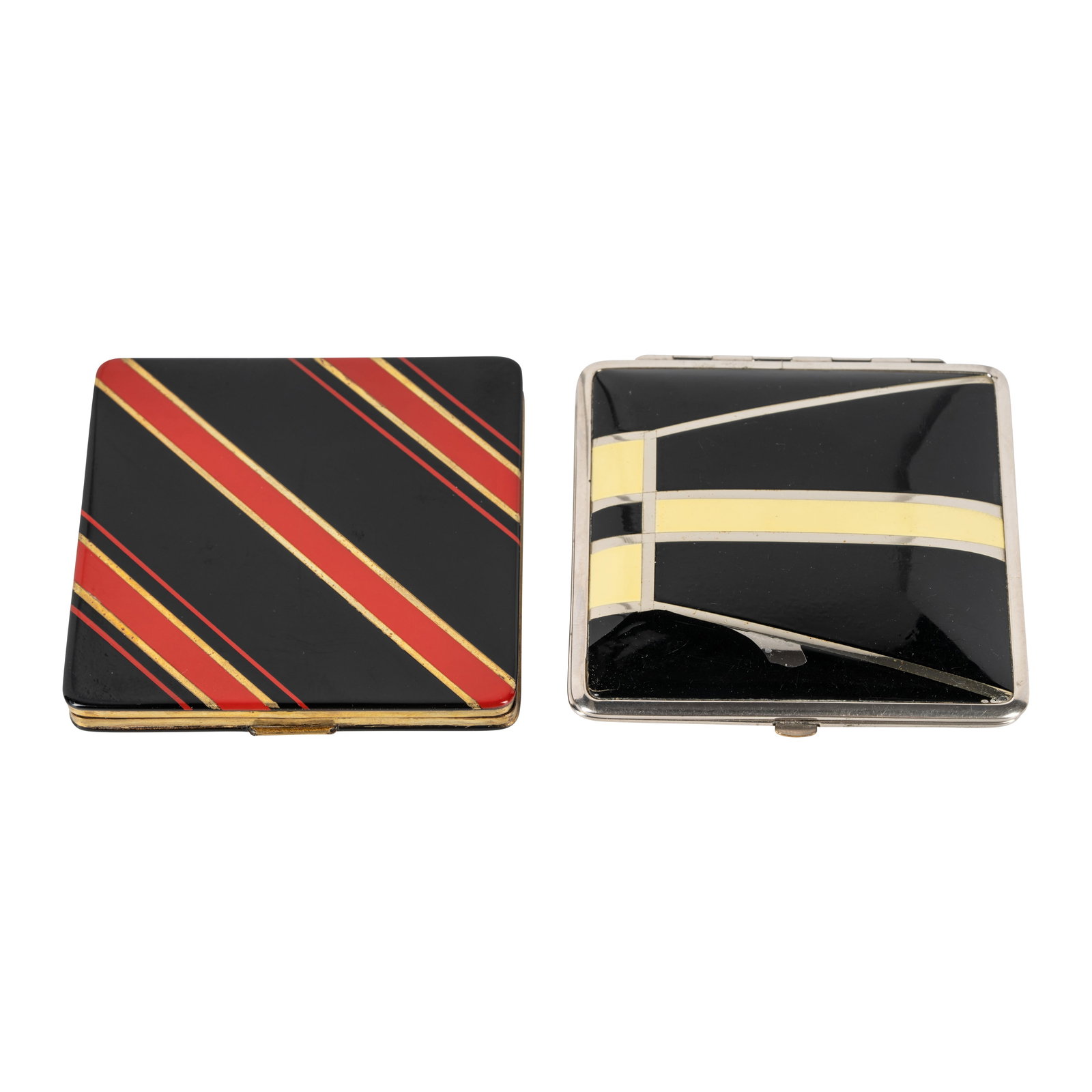 Art Deco (English and American) A compact and a cigarette case: 1930s Enamelled white plated metal Red and Black cigarette case: impressed stamp 'MADE IN ENGLAND' to interior, Cream and black compact (American): interior stamped 'D.R.P.' Red and black case: 7.7cm